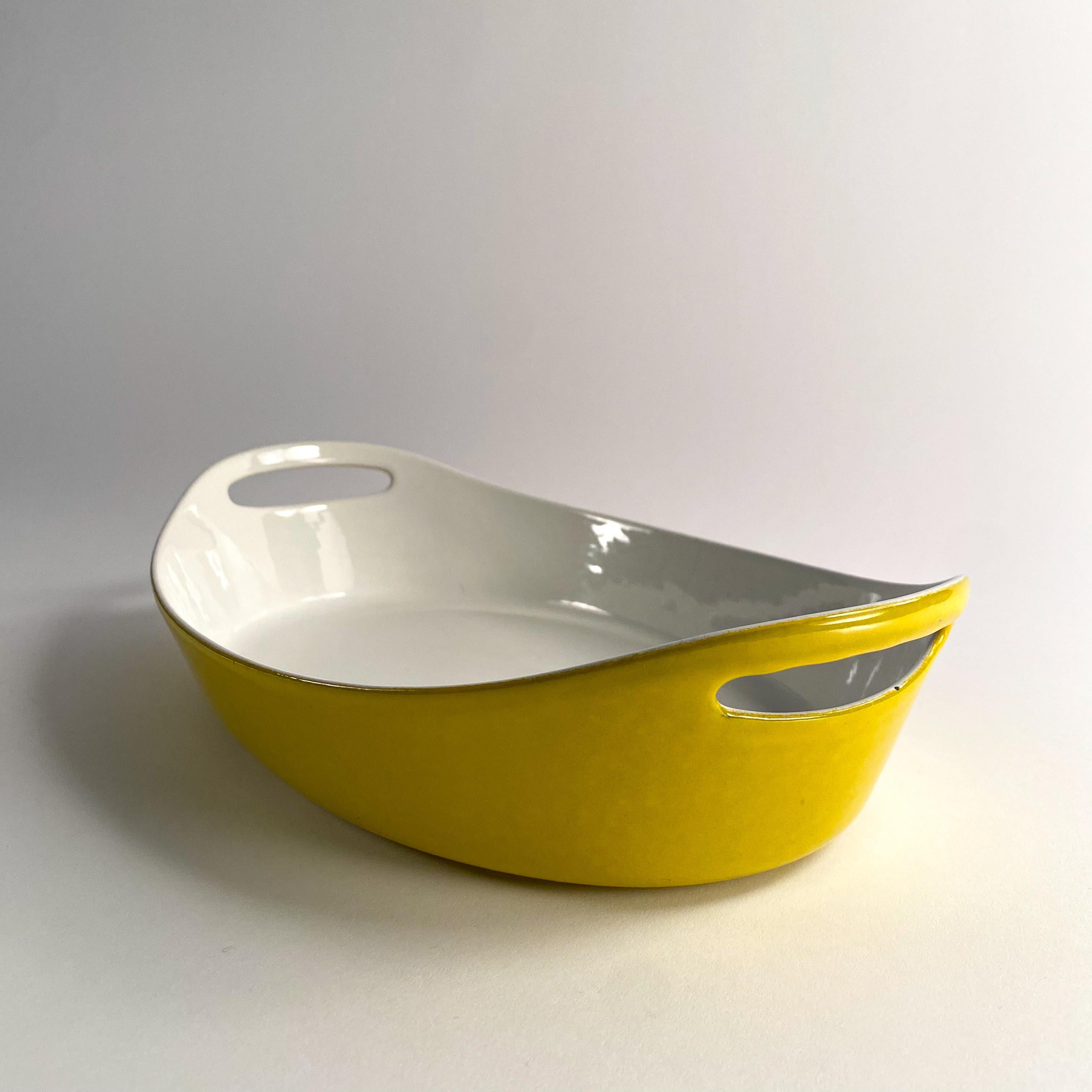 vintage yellow enameled castiron casserole dish by Michael Lax for Copco In Good Condition For Sale In Philadelphia, PA