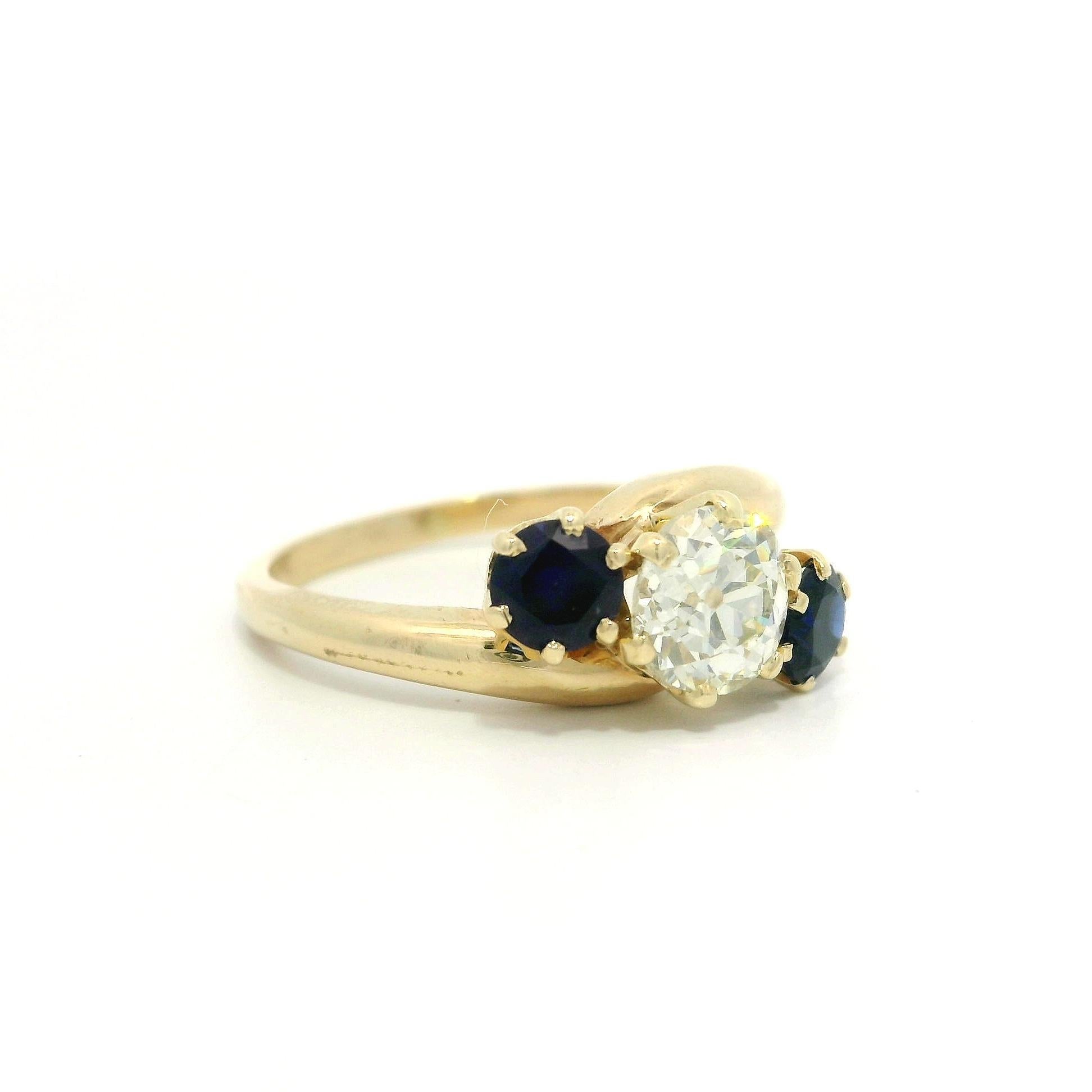 Anello vintage in oro giallo con diamanti taglio europeo da 1,45 carati e accenti di zaffiro ai lati in vendita 3