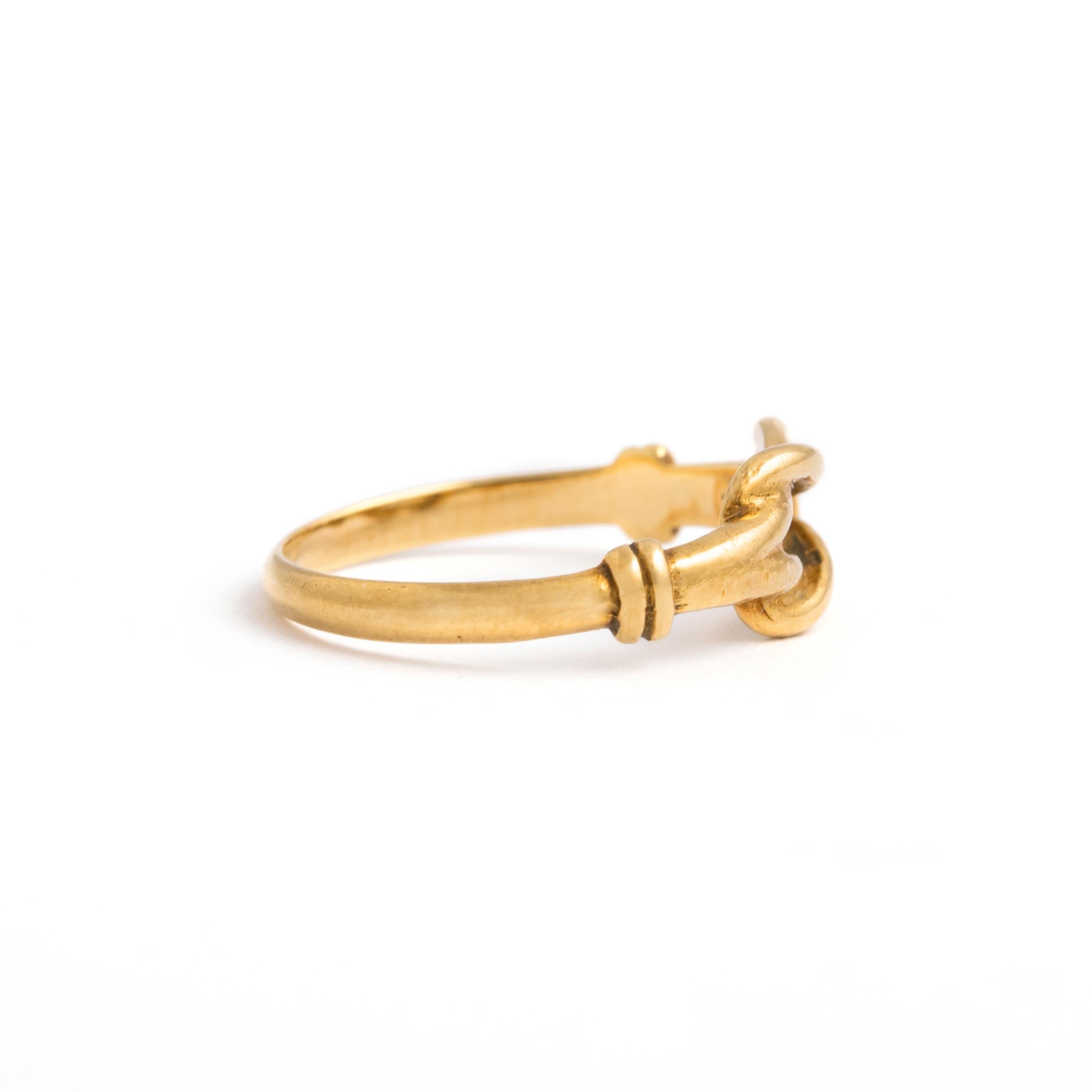 A beautifully crafted vintage ring in 18K yellow gold. This delicate and fine piece showcases timeless elegance with its slender design, making it ideal for everyday wear or as a statement of understated luxury. 

The rich yellow gold adds a warm