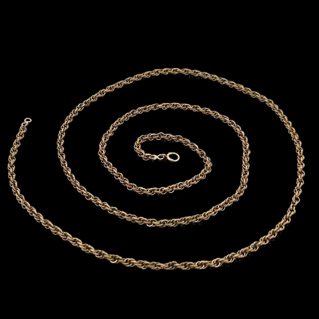 Collana d'epoca in oro giallo a doppio cavo intrecciato lunga 30