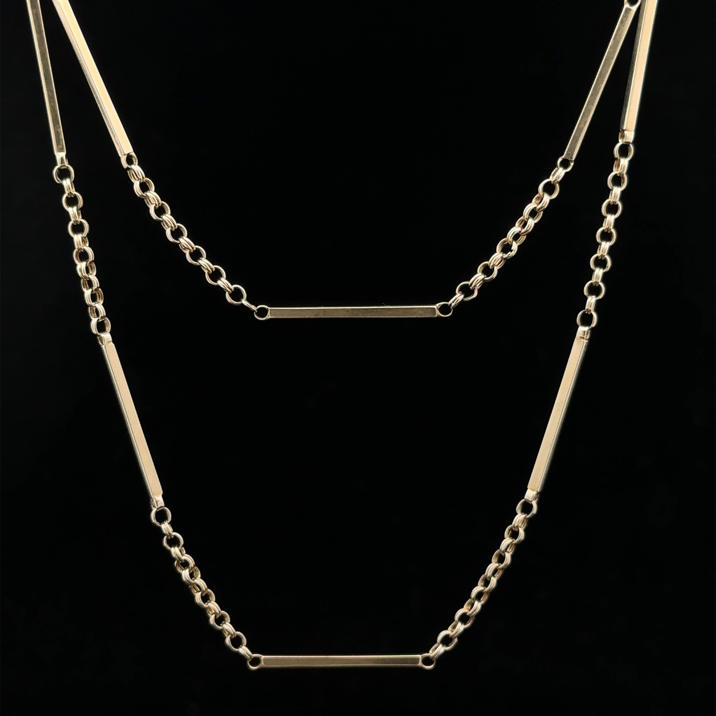MATERIAL : Or jaune 14k massif
Poids : 12,04 grammes
Type de chaîne : Double maillon de câble avec sections de maillon de barre 
Longueur de la chaîne : 32 pouces (mesurée à côté d'une règle)
Épaisseur de la chaîne : 1,1 mm (au niveau du maillon de