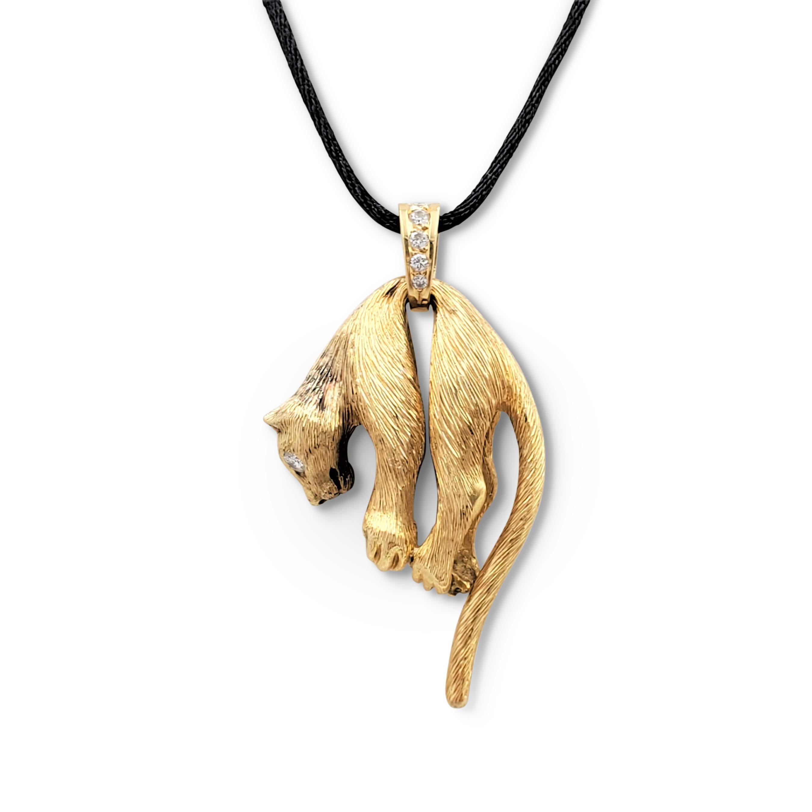 Crafted in 18k brushed gold, the pendant depicts a panther with round brilliant cut diamond eyes weighing an estimated 0.15 carats (F, VS). The gold bail is accented with an additional 0.20 carats of round brilliant diamonds. Patina consistent with