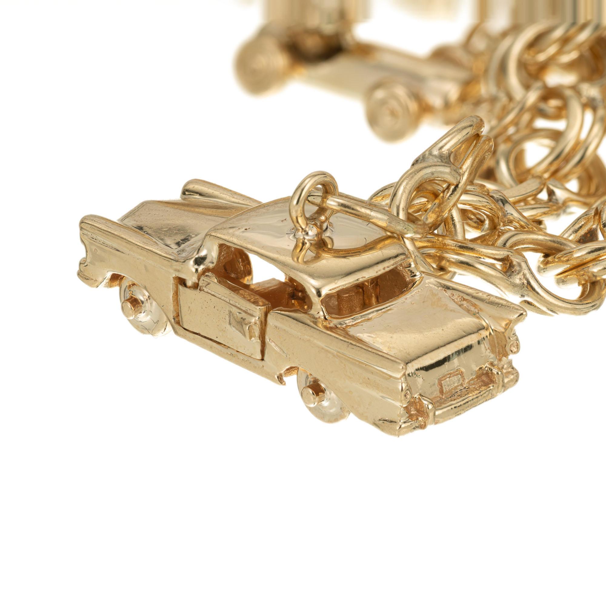 Vintage Yellow Gold Car Themed Charm Bracelet In Good Condition For Sale In Stamford, CT