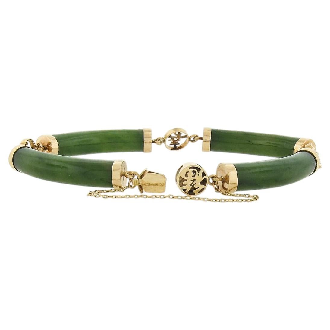 Bracciale vintage in oro giallo con maglie ricurve in giada e simboli cinesi lucidi