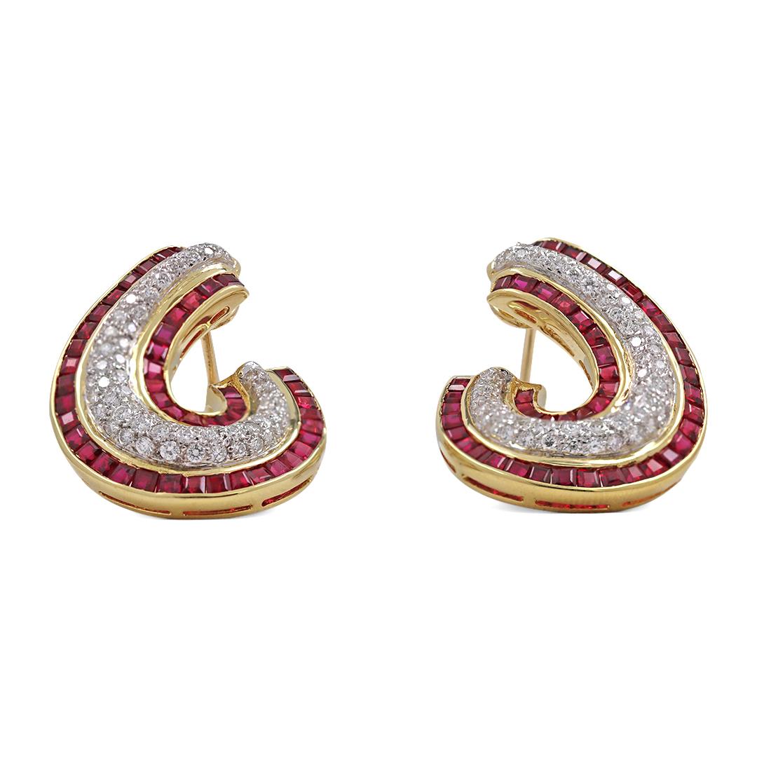 Vintage diamond and ruby front-to-back earrings crafted in 18 karat yellow gold. This classical design features two rows of bright red square cut natural rubies weighing an estimated 2.80 carats total weight adjacent to three rows of round brilliant