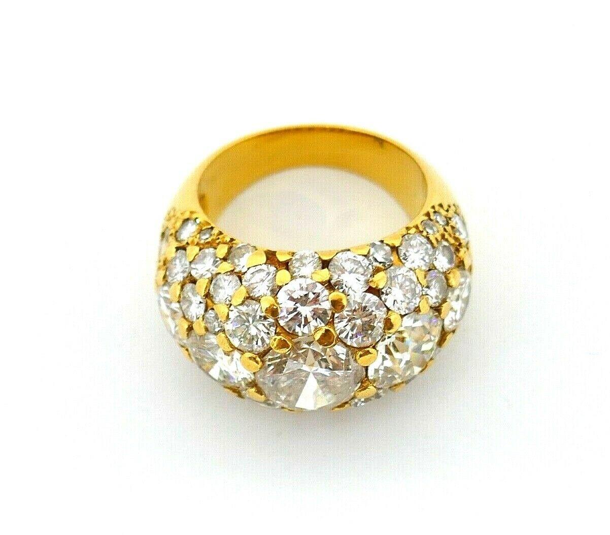 Vintage 14k yellow gold diamond cocktail dome ring. All diamonds are Old European cut, H-I color, SI2 clarity. Center diamond is 1.30-1.40 cts, two side diamonds are about 0.80 points each. Smaller two side diamonds are  0.40 points each. For the