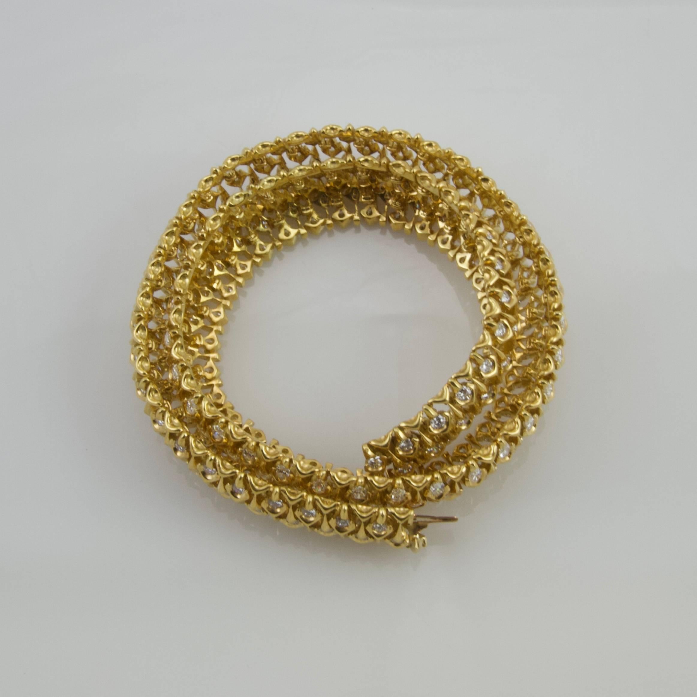 Open weave 18kt yellow gold necklace adorned with pear shape diamond and brilliant cut diamond. 
Weight of diamonds approximately 20 carats.
French work circa 1970.
Maker's mark of Mauboussin. Numeroted and signed Mauboussin. Famous jeweler in Paris