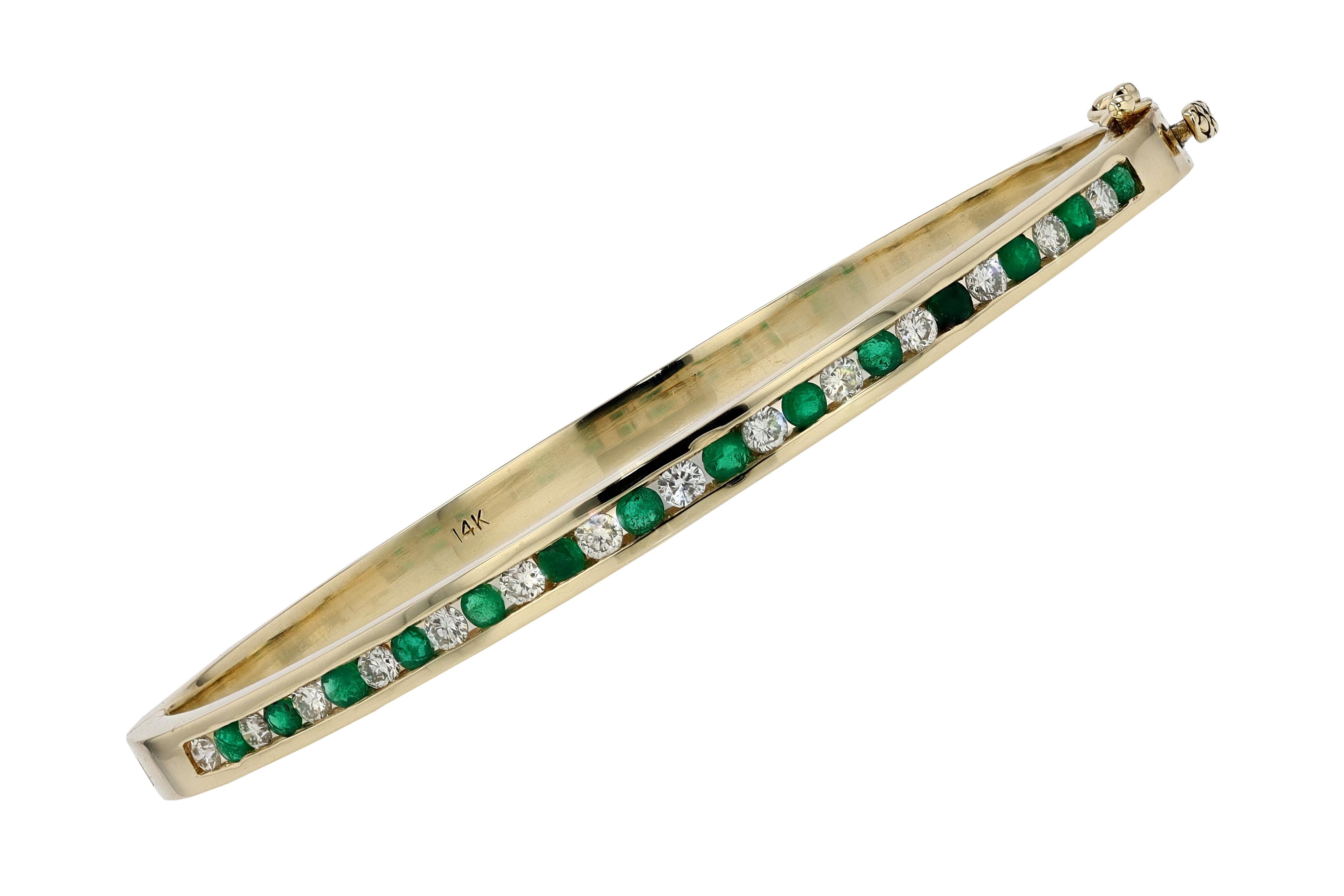 Vintage Yellow Gold Emerald and Diamond Bangle Bracelet In Good Condition In Santa Barbara, CA