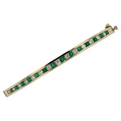 Vintage Yellow Gold Emerald and Diamond Bangle Bracelet