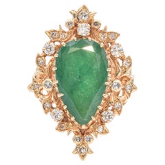 Bague en or jaune vintage avec émeraude et diamant