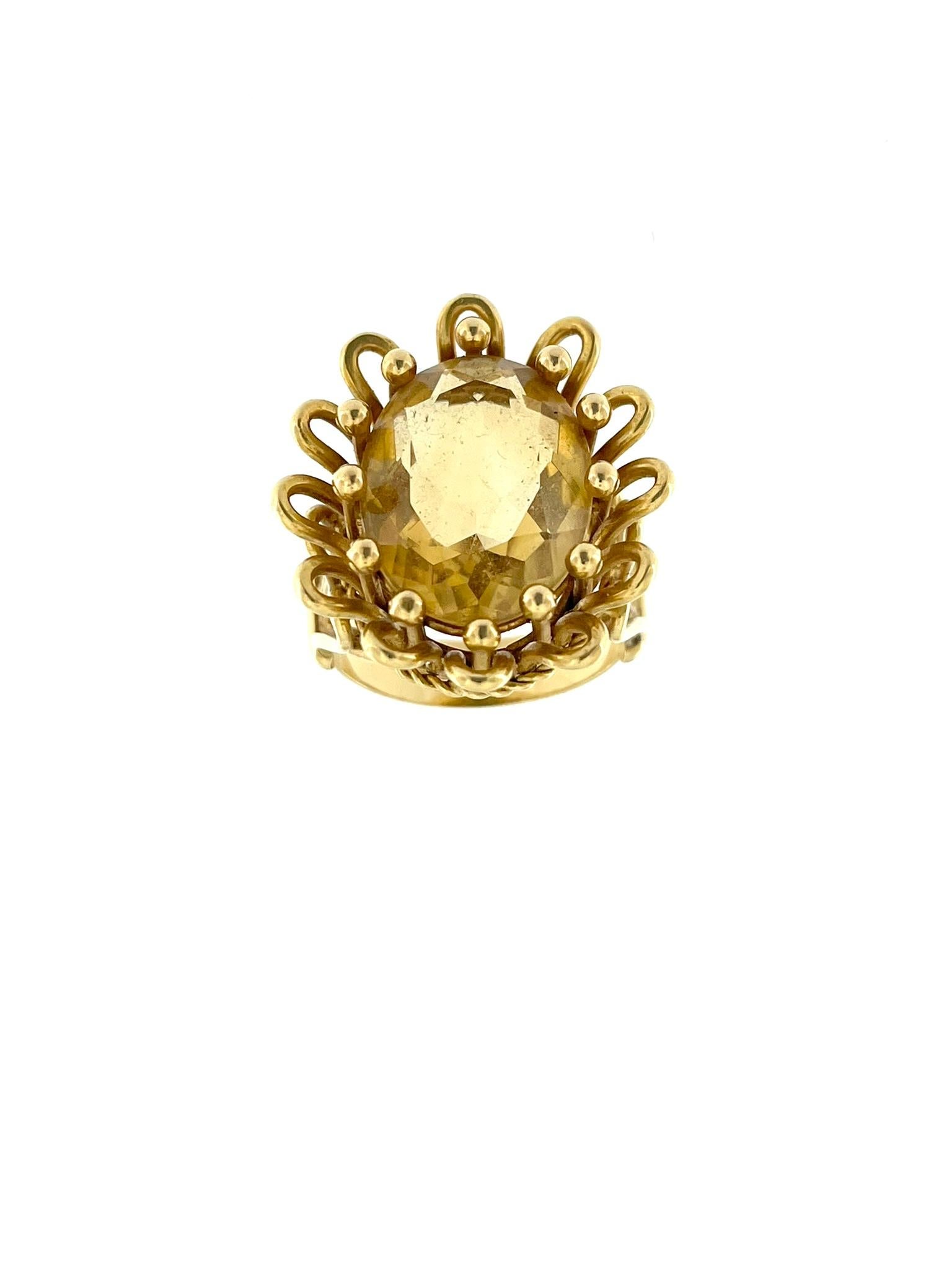 The Vintage Yellow Gold Hand-Made French Ring with an 11.00ct Citrine is a testament to the artistry and craftsmanship of French jewelry design. Crafted from 18-karat yellow gold, this ring exudes warmth and luxury, embodying the elegance and