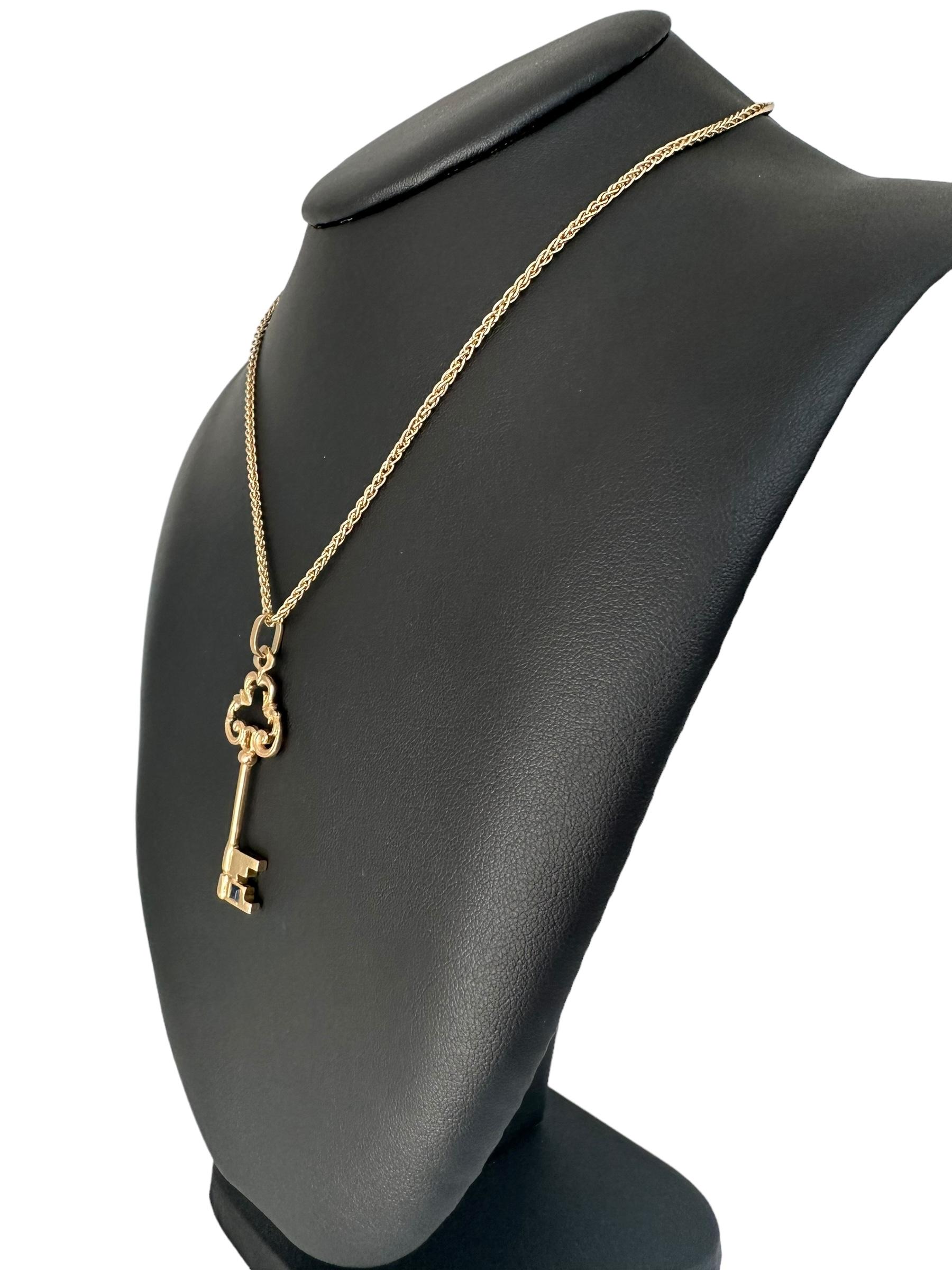 Vintage Yellow Gold Key Pendant with Sapphire For Sale 1