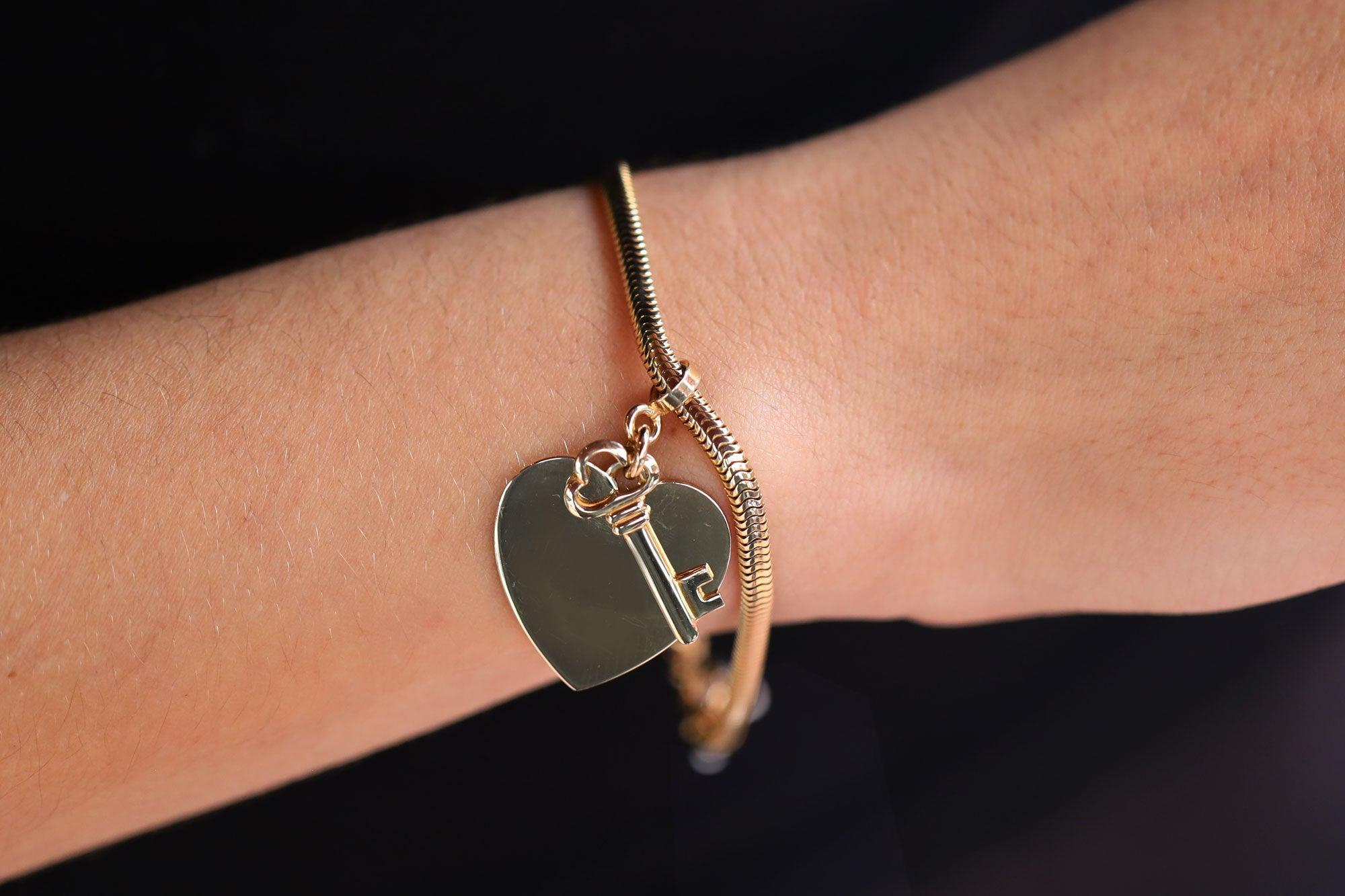 Vintage Yellow Gold Key To My Heart Charm Bracelet In Good Condition For Sale In Santa Barbara, CA