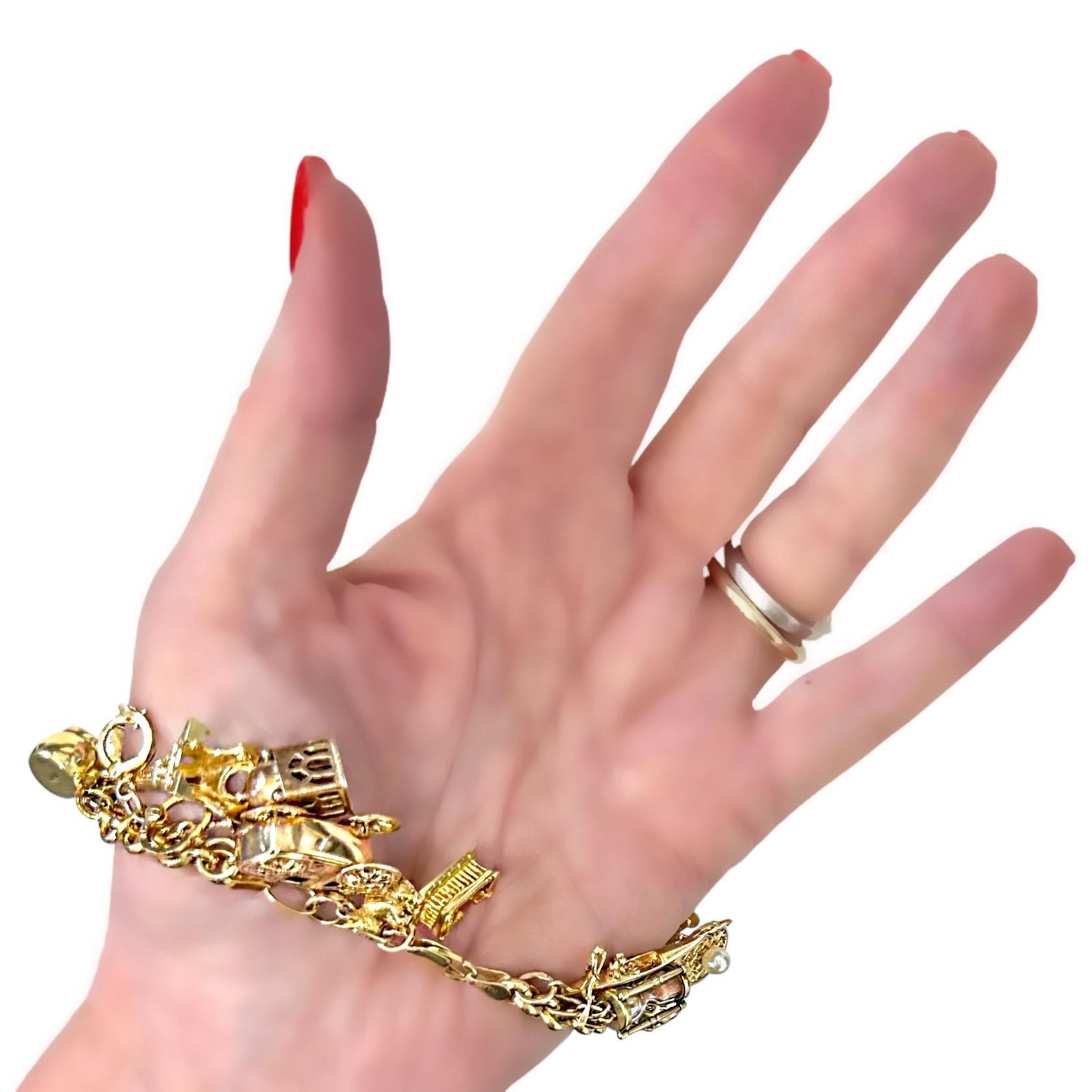 Vintage Yellow Gold Mid-Century Charm Bracelet with 27 Charms For Sale 9