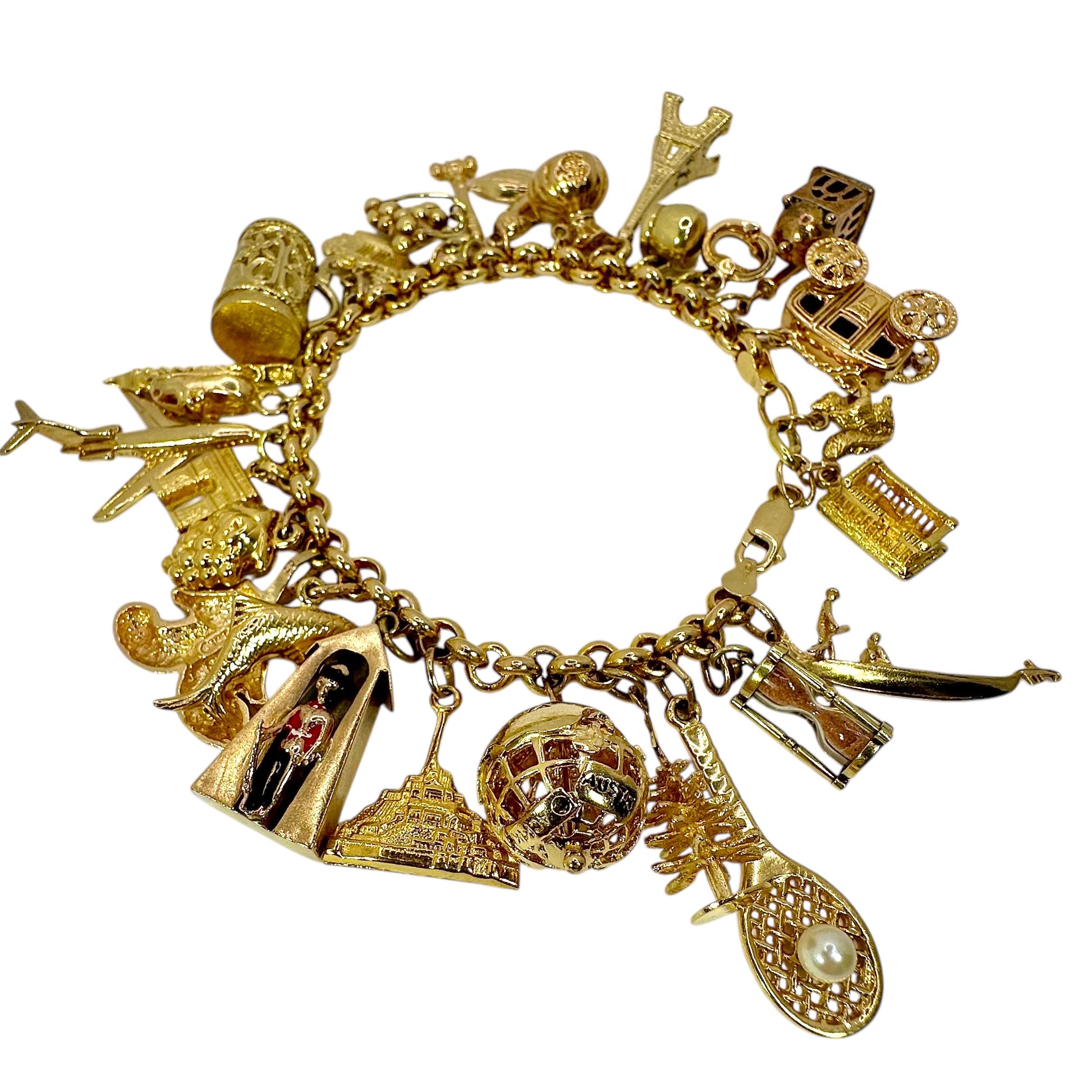 Vintage Yellow Gold Mid-Century Charm Bracelet with 27 Charms For Sale 2