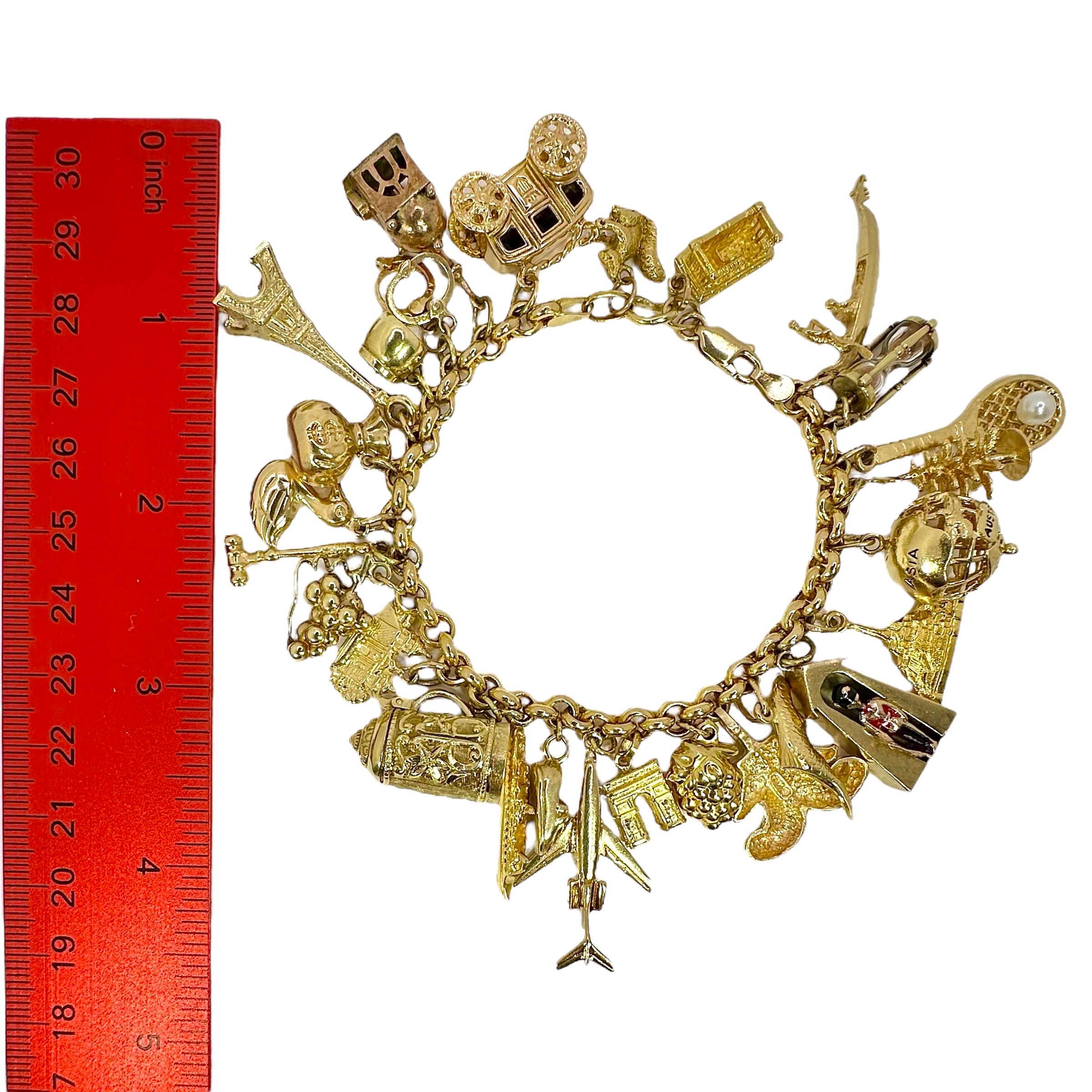 Vintage Yellow Gold Mid-Century Charm Bracelet with 27 Charms For Sale 4