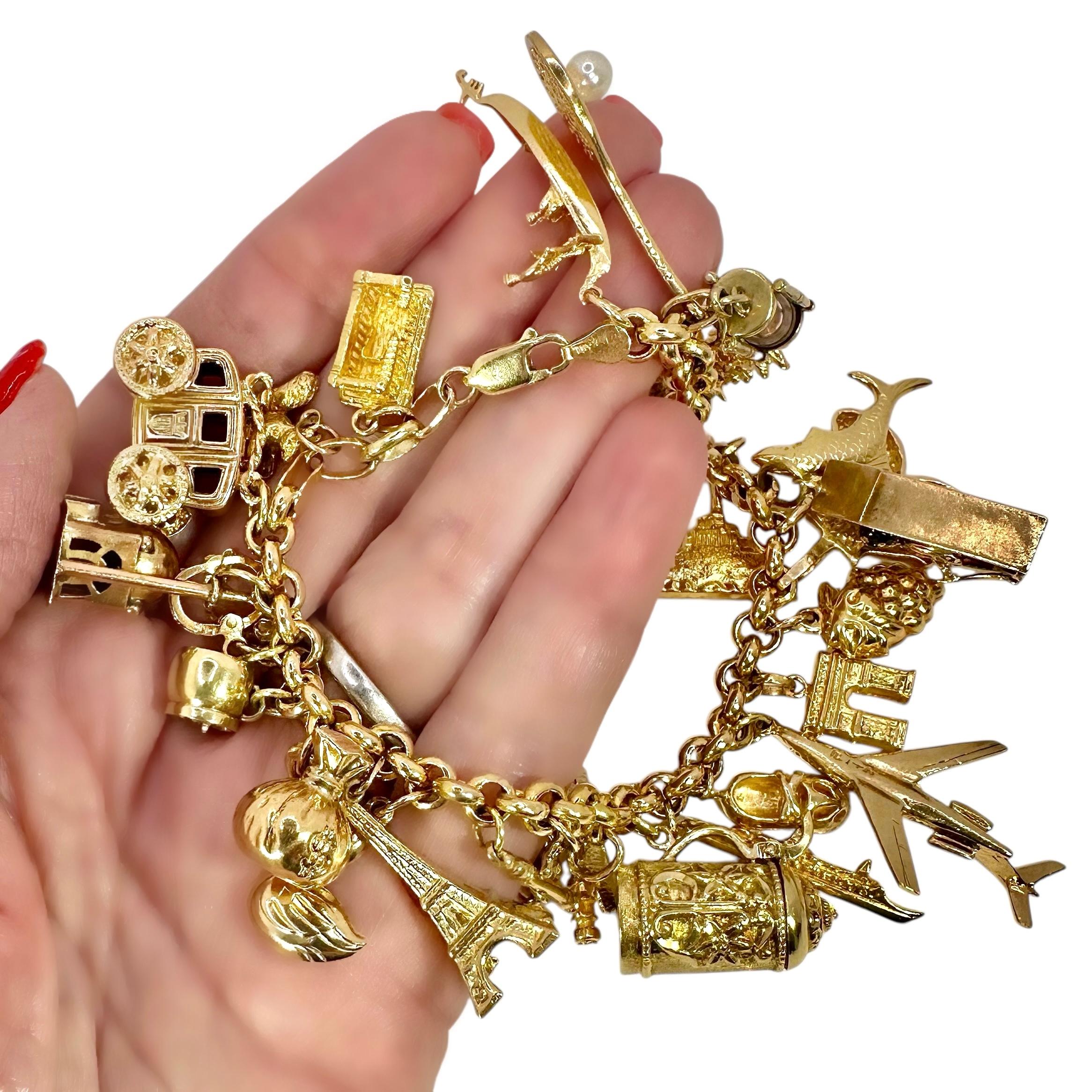 Vintage Yellow Gold Mid-Century Charm Bracelet with 27 Charms For Sale 5