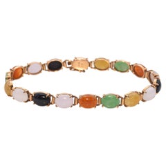 Pulsera vintage de oro amarillo con cabujón de jade multicolor