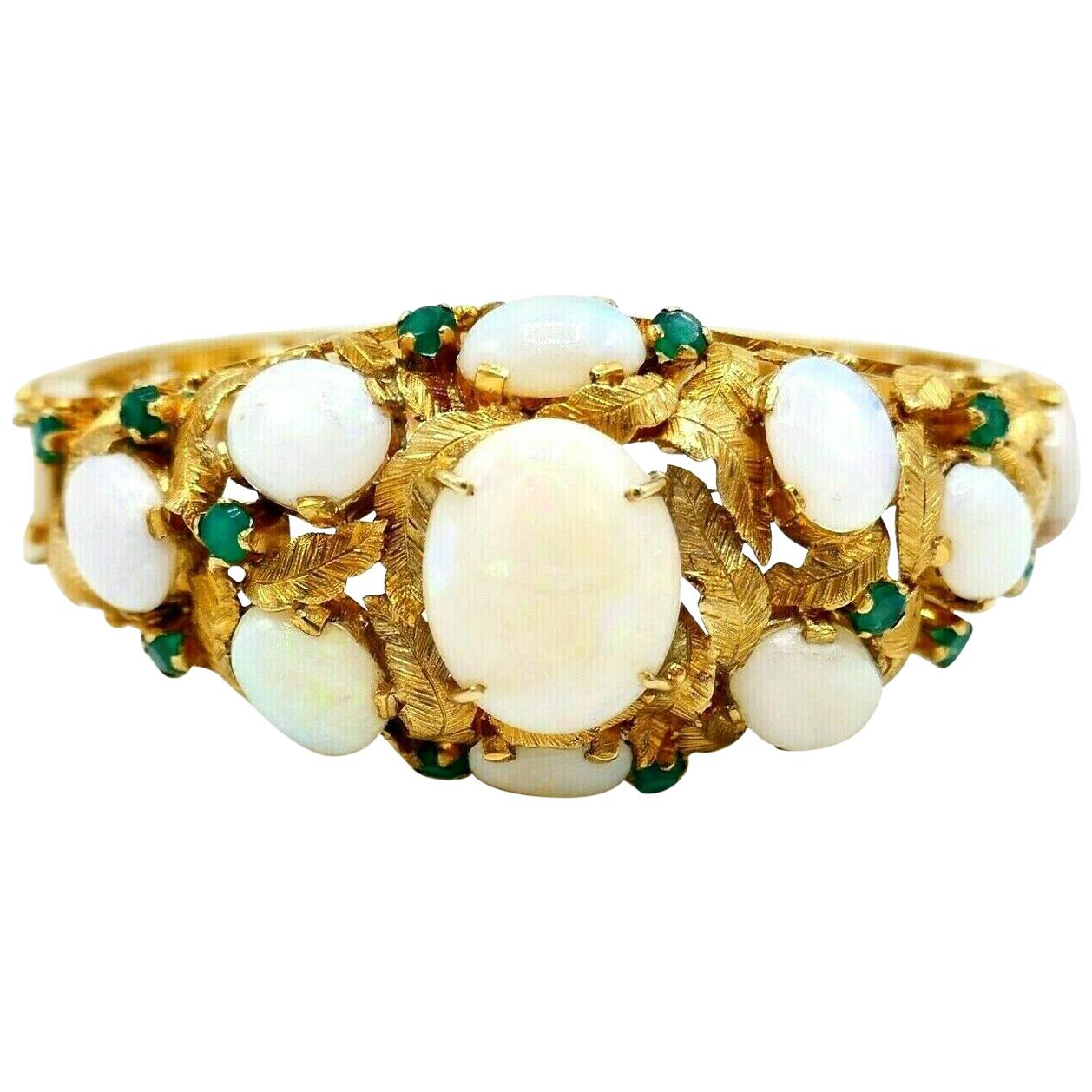 Bracelet jonc vintage en or jaune avec opales et émeraudes