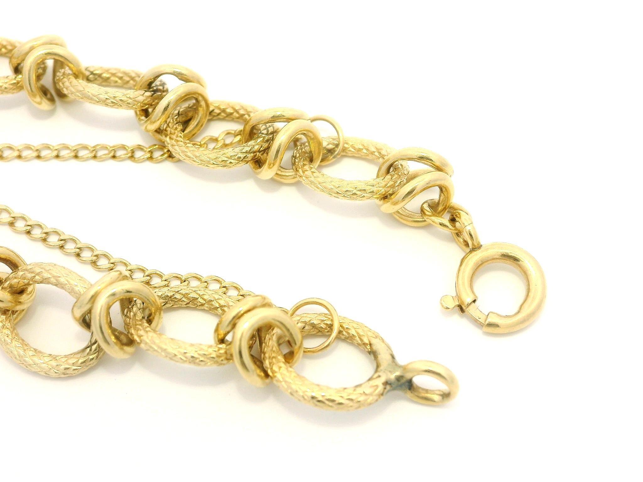 Bracciale d'epoca in oro giallo aperto ovale con pelle di serpente e stazione a spirale A Link In condizioni ottime in vendita a Montclair, NJ
