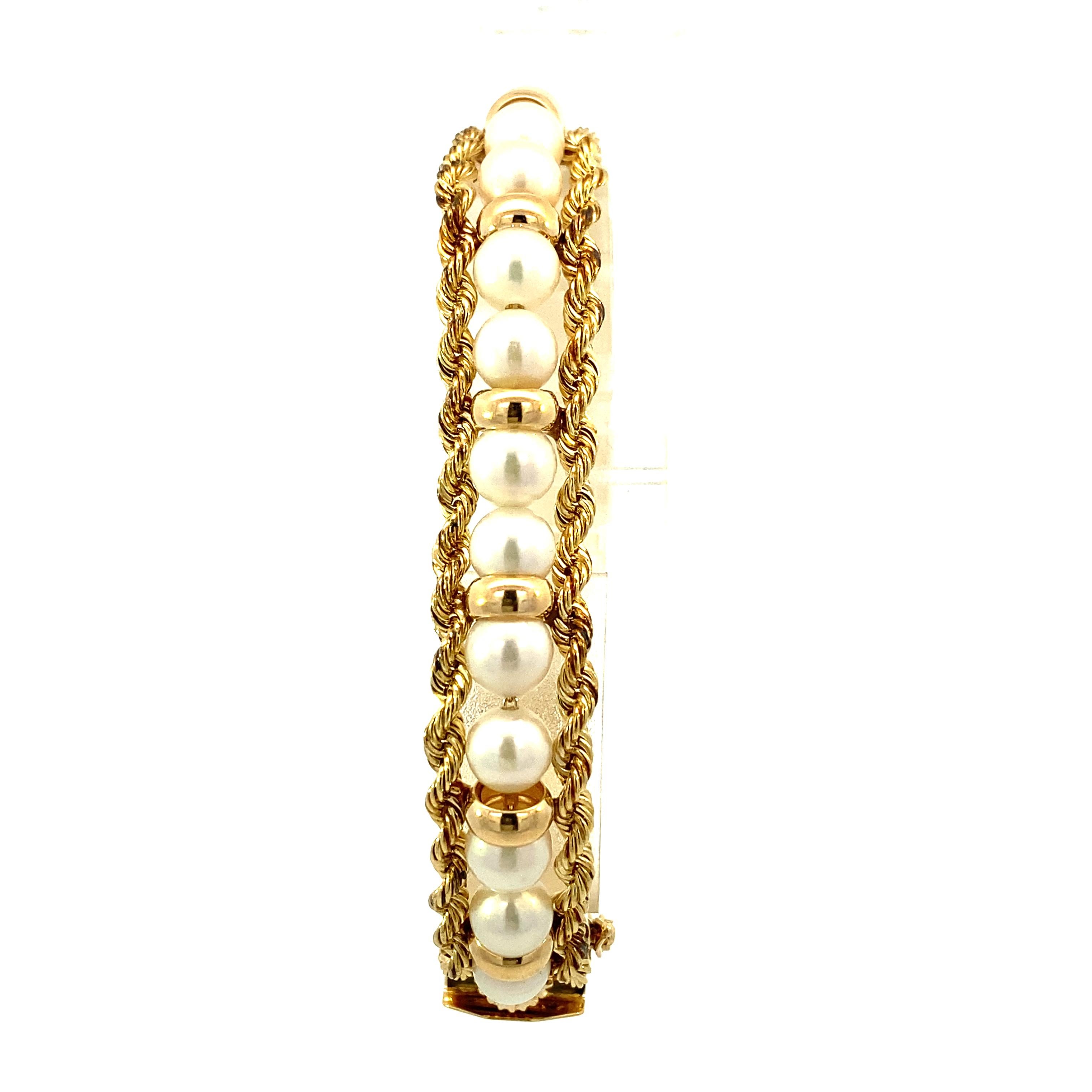 Vintage Yellow Gold Pearl Bracelet. Beautiful and classic 14k yellow gold vintage bracelet with 24 - 6.0-6.5 mm pearls alternating with gold beads and two parallel gold rope strands. Secure box clasp with single safety-8 included. Flexible design