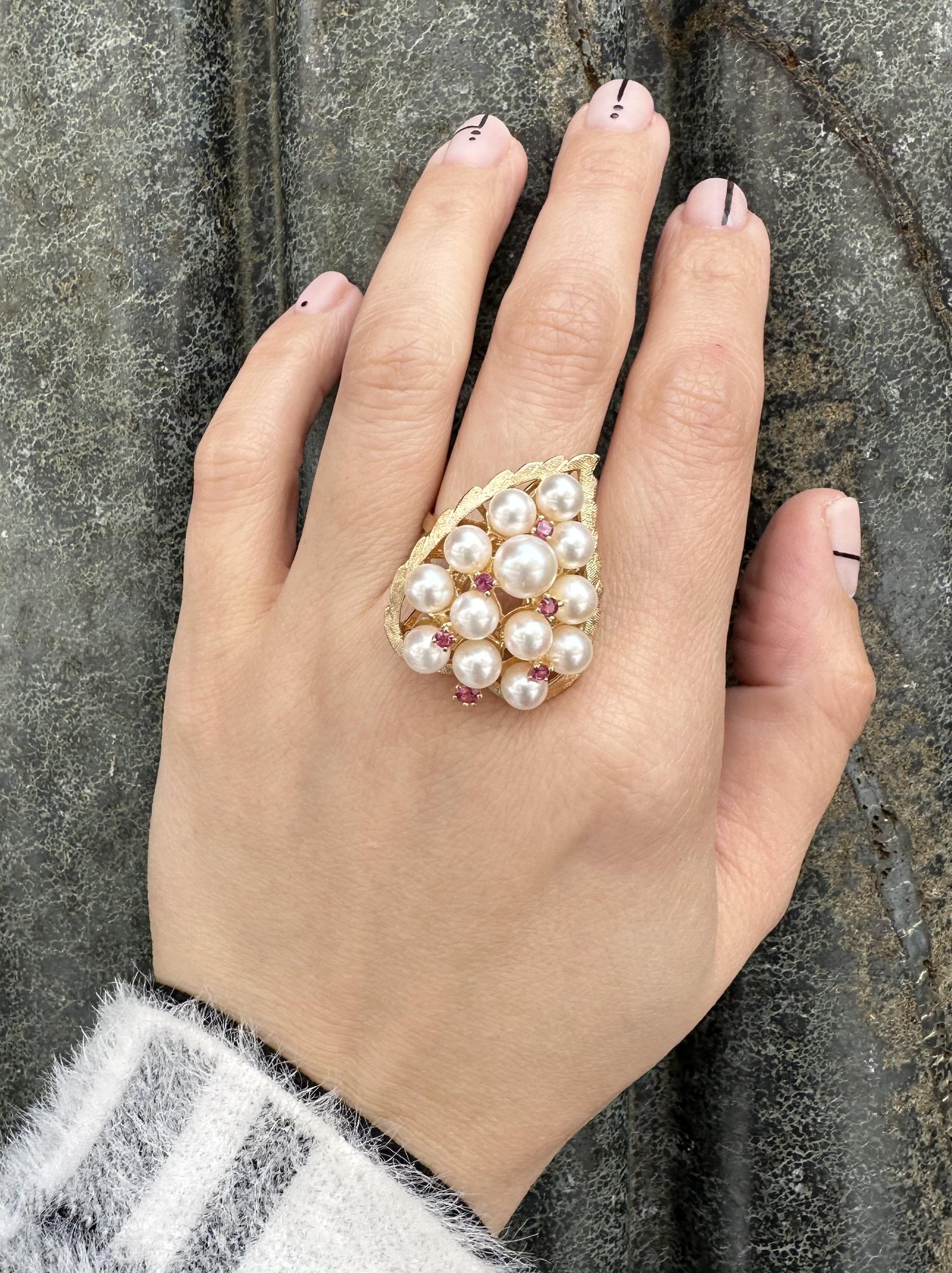–Stone(s)–
(13) Genuine Cultured Pearls - Round Shape - White Color w/ Excellent Luster - Range from 5.5mm to 7.1mm (approx.)
(6) Natural Genuine Red Stones - Old Round Cut - Bright Red Color - 0.35ctw (approx.)

Material: 14k Yellow Gold
Weight: