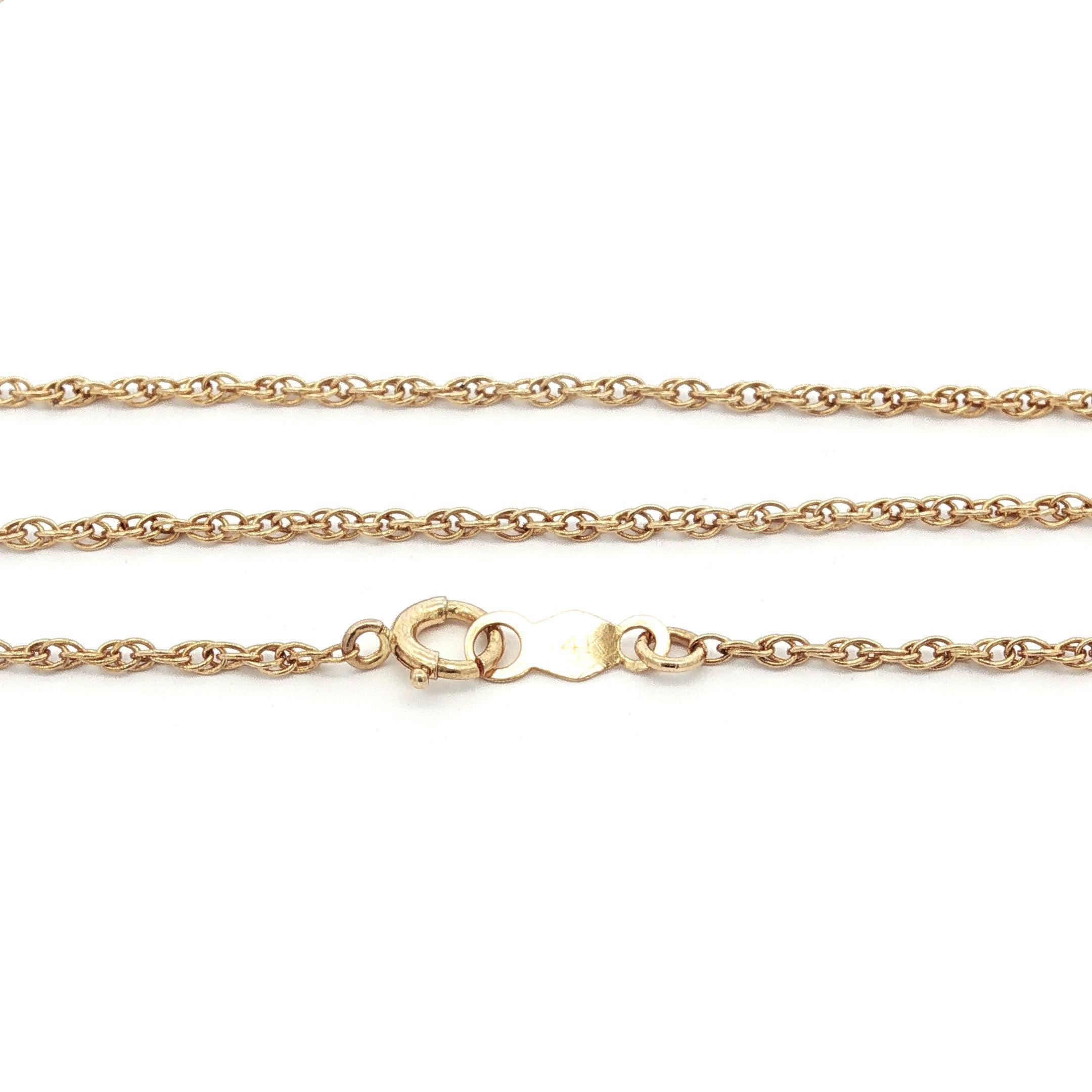--Pierre(s) :...
(1) Perle de culture véritable - forme demi-ronde - couleur blanche avec reflets rose clair - 6 mm (approx.)

MATERIAL : Or jaune 14k massif
Poids : 3 grammes
Type de chaîne : 0.9mm - 18 Inches - Chaîne ouverte à maillons torsadés