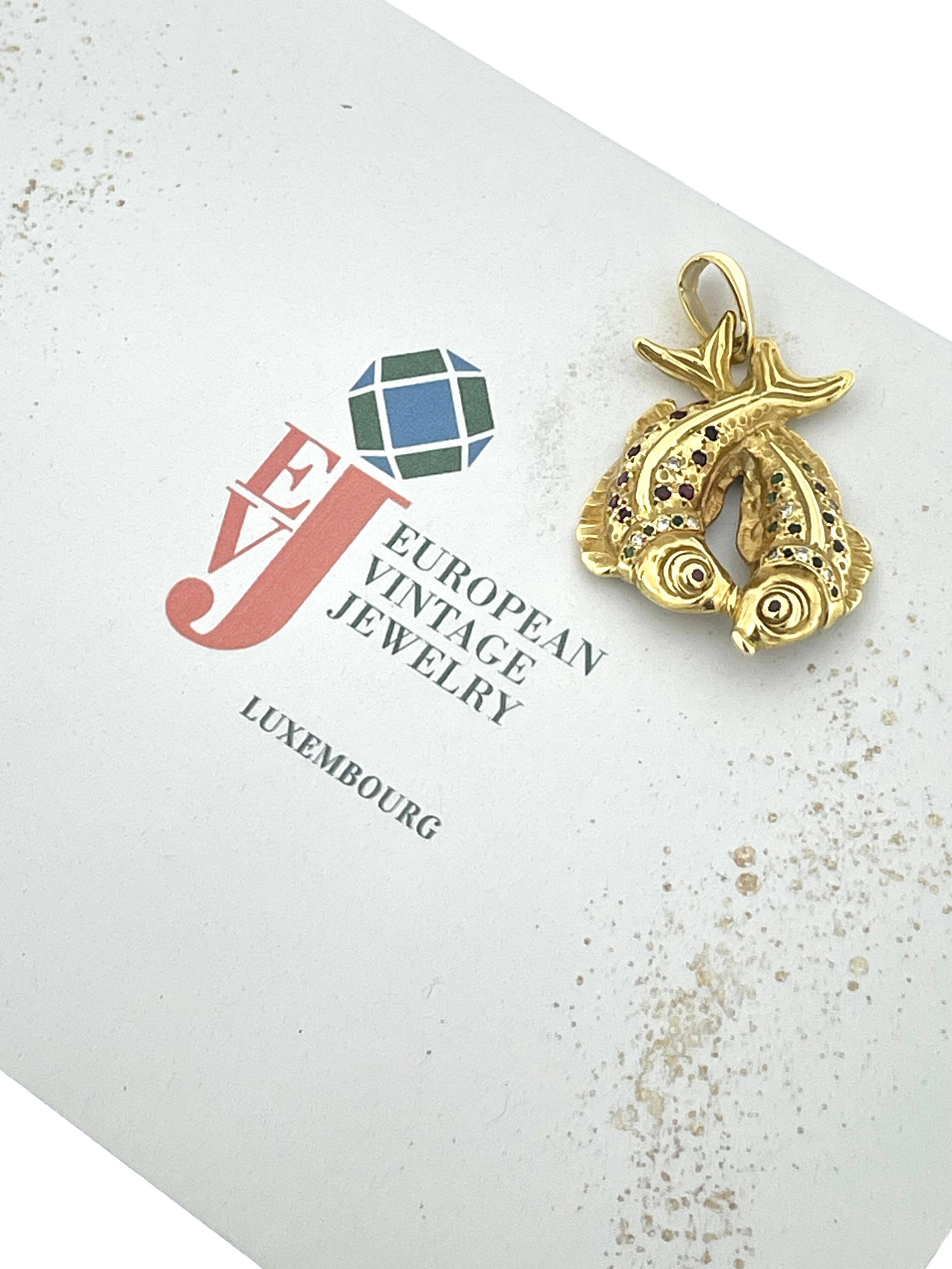 The Vintage Yellow Gold Pisces Zodiac Sign Pendant is a stunning and intricately crafted piece of jewelry that exudes elegance and charm. Crafted from high-quality 18kt yellow gold, this pendant showcases exquisite artistry and attention to