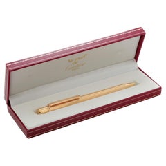 Stylo à bille vintage Must de Cartier plaqué or jaune Cartier Serial 592371