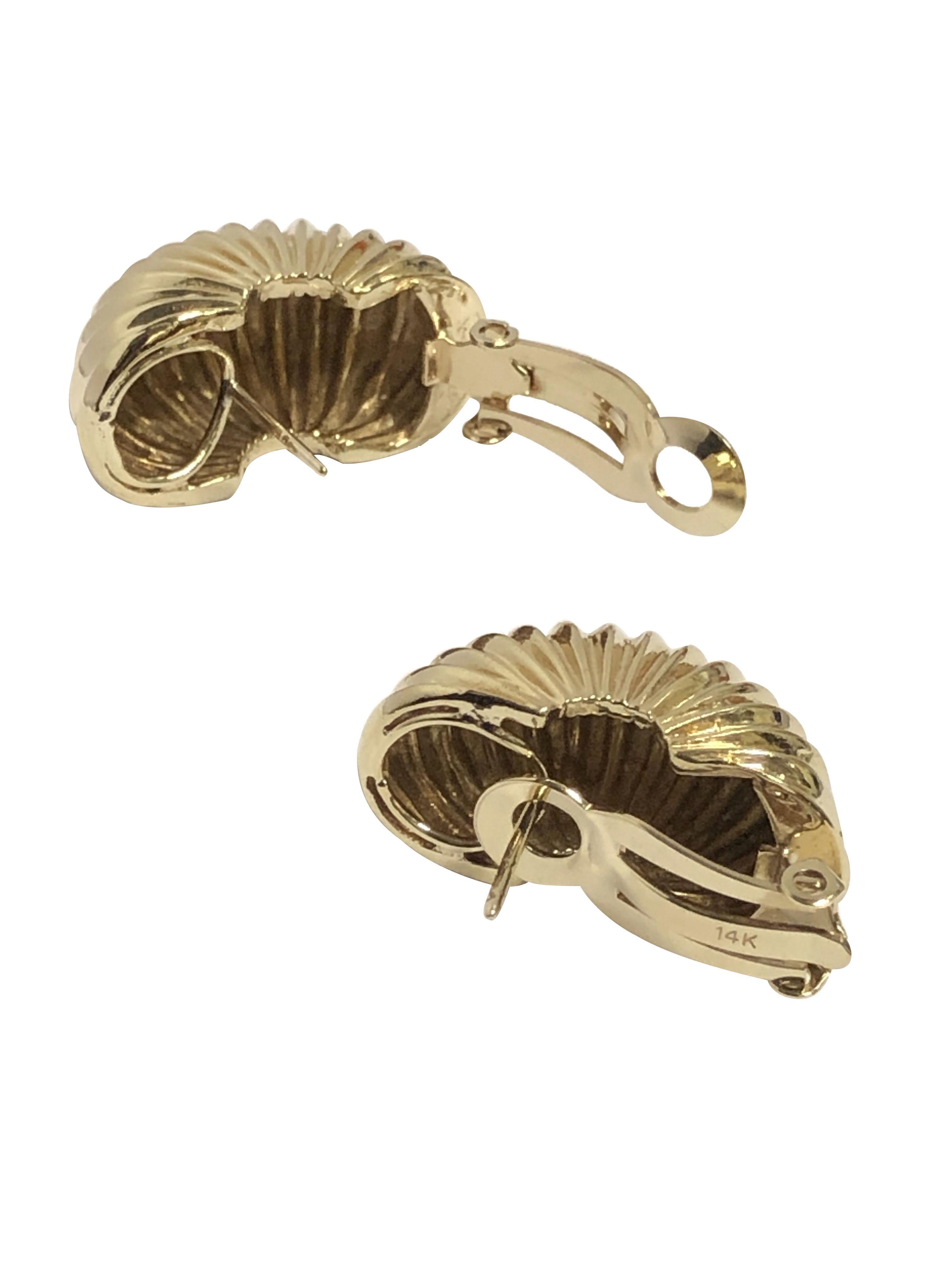 Circa 1980s  14k Yellow Gold Earrings in an Elegant Scalloped Shrimp design, measuring 1 inch in length, 1/2 inch wide and weighing 16 Grams. Clip Backs with a post.