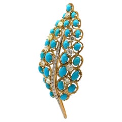 Broche à grande feuille en or jaune avec turquoise et diamants