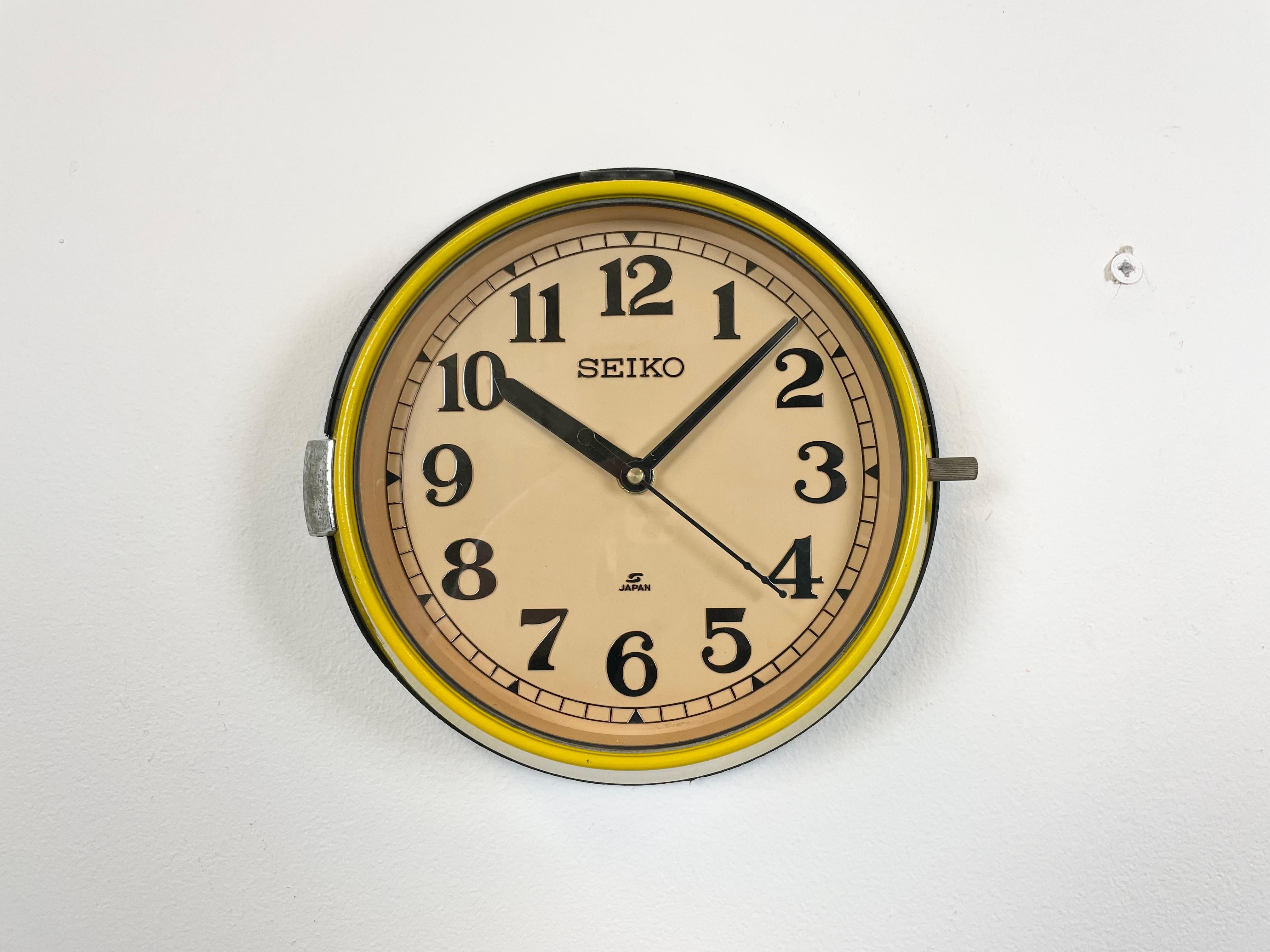 Vintage Seiko navy slave clock designed during the 1970s and produced till 1990s. These clocks were used on large Japanese tankers and cargo ships. It features a yellow metal frame, a plastic dial and clear glass cover. This item has been converted