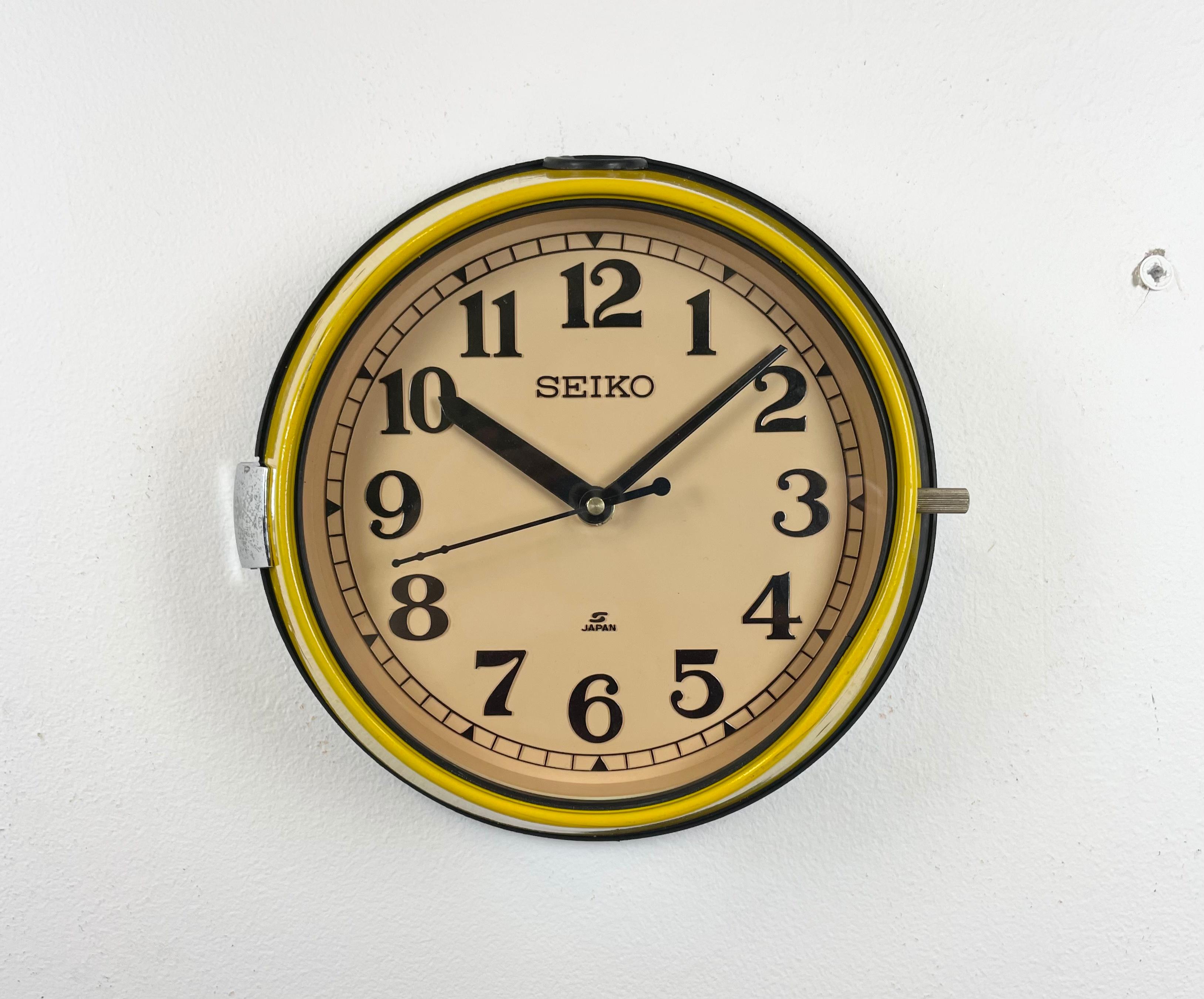 Vintage Seiko navy slave clock designed during the 1970s and produced till 1990s. These clocks were used on large Japanese tankers and cargo ships. It features a yellow metal frame, a plastic dial and clear glass cover. This item has been converted