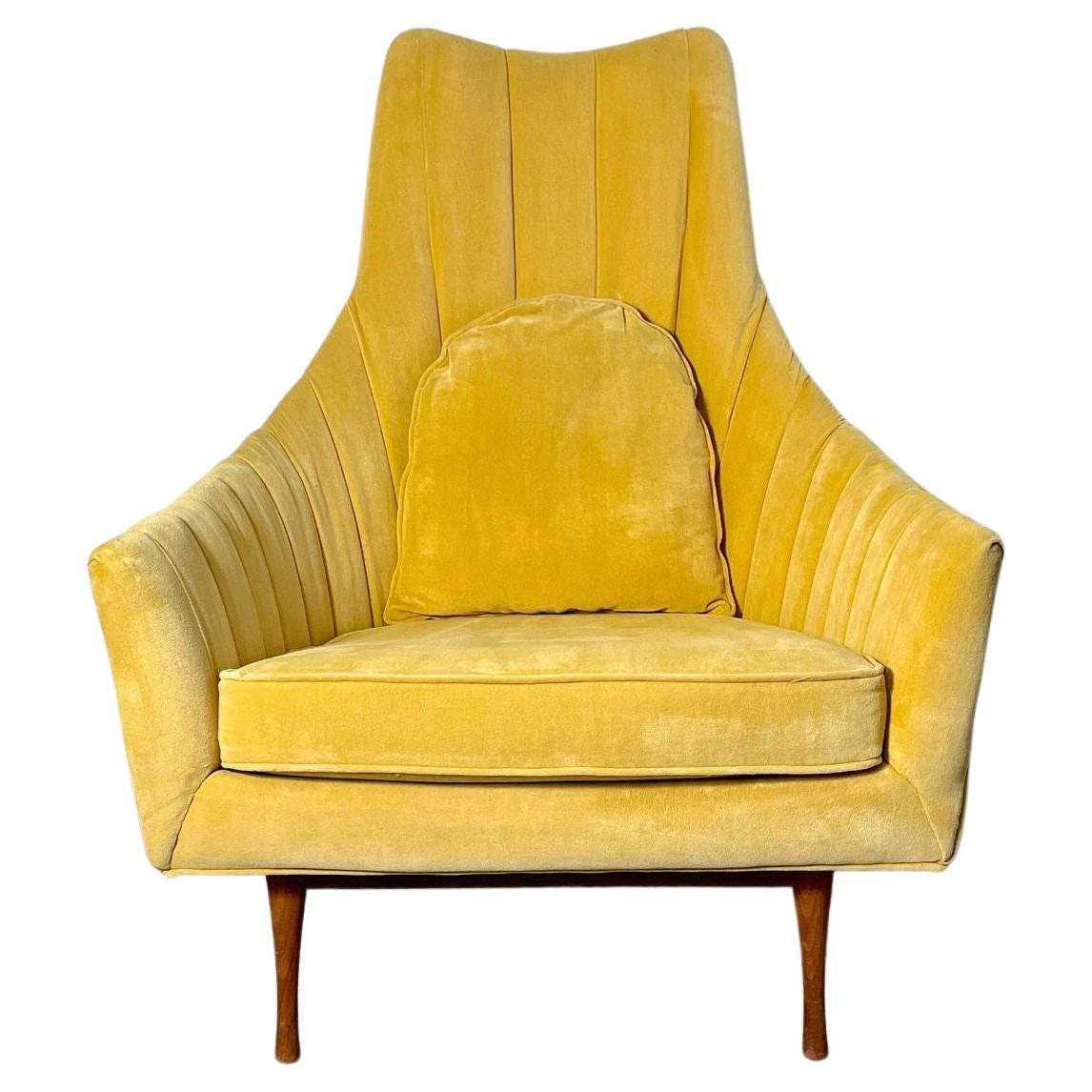 Vintage Paul McCobb Lounge Chair Symmetric Group Widdicomb 1950s

A rare Symmetric Group lounge chair designed by Paul McCobb for Widdicomb 
High back design with generous proportions on hourglass walnut legs
Upholstered in a vintage yellow velvet