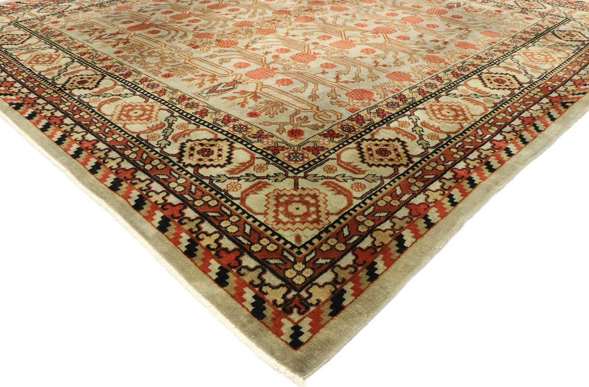 53031, vintage Yerevan Khotan rug with Pomegranate Design. Blending elements from the modern world with rustic sensibility, this hand knotted wool vintage Yerevan Khotan rug will boost the coziness factor in nearly any space. The abrashed field is
