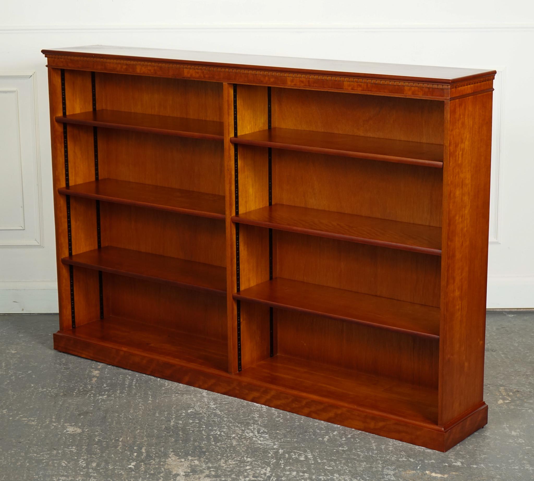 
We are delighted to offer for sale this Yew Wood Twin Low Open Bookcase With Adjustable shelves.

A vintage Yew double fronted low open bookcase with adjustable shelves is a stylish and functional piece of furniture that offers a classic design