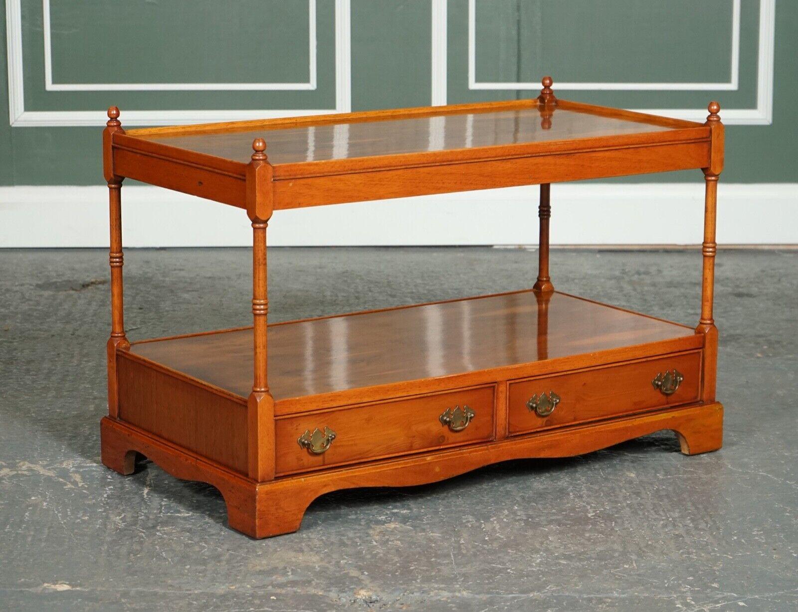 Vintage Yew wood Georgian-Style coffee table or TV stand with two drawers.

A beautiful table can be used as coffee table or TV cabinet. It serves two drawer with original brass handles.

We have lightly restored this by cleaning, hand waxing,