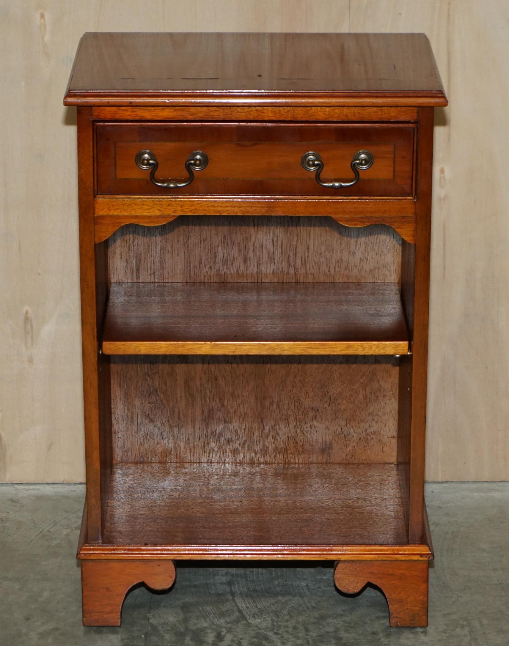 We are delighted to offer this lovely vintage yew wood side table bookshelf with single drawer

A very good looking and well made piece, ideally suited to sitting beside a chair with a lamp, picture frame and glass of wine on 

The timber has