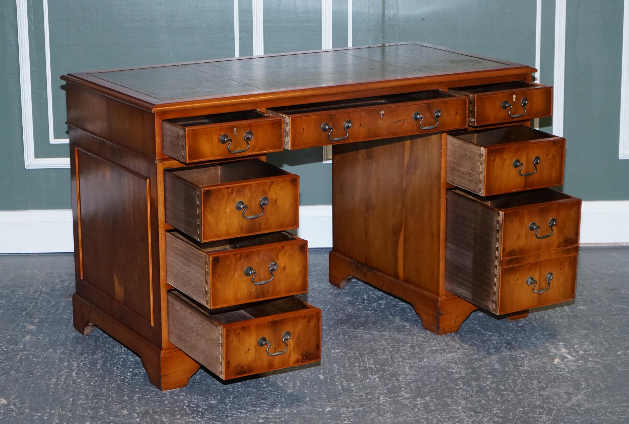 We are delighted to present this stunning Twin pedestal Burr yew wood desk.

Lovely well made desk raised on two pedestals. There's a total of nine drawers to give you plenty of storage space.

The top lifts off the two pedestals but will fall