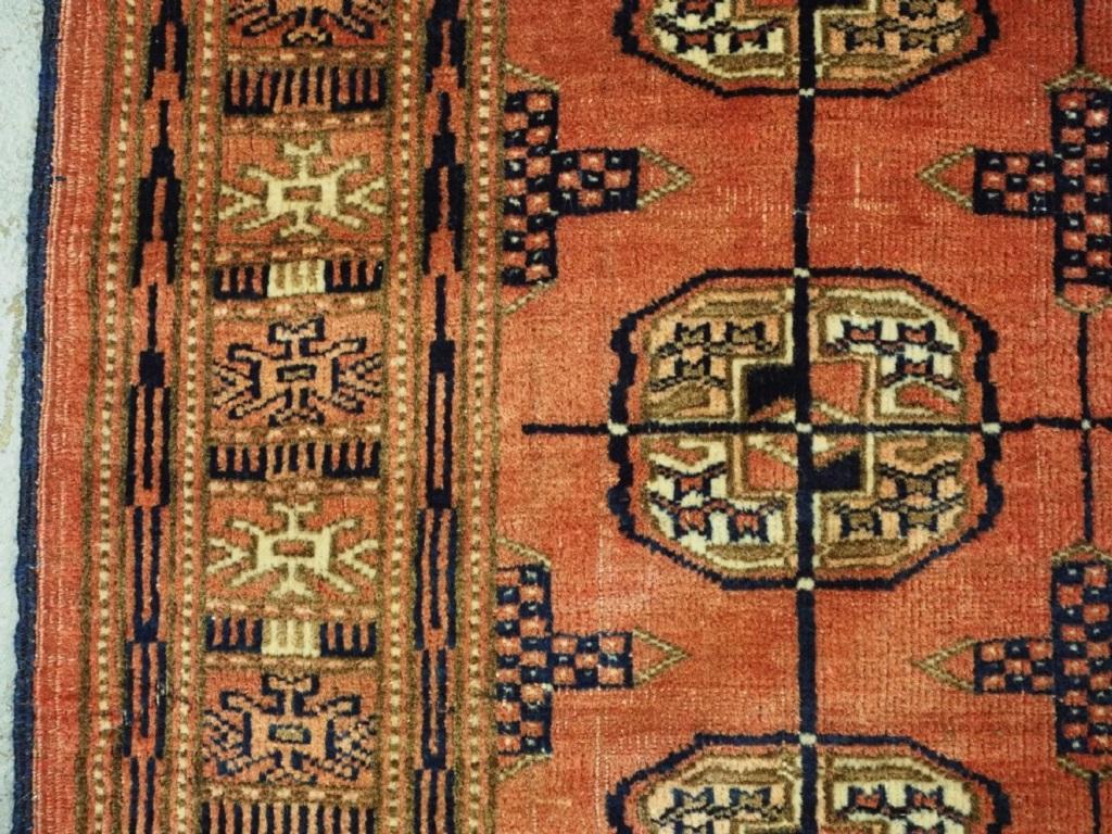 Kilim Vintage Yomut Turkmen Rug, Traditional Design with Faded Red, Circa 1930 For Sale