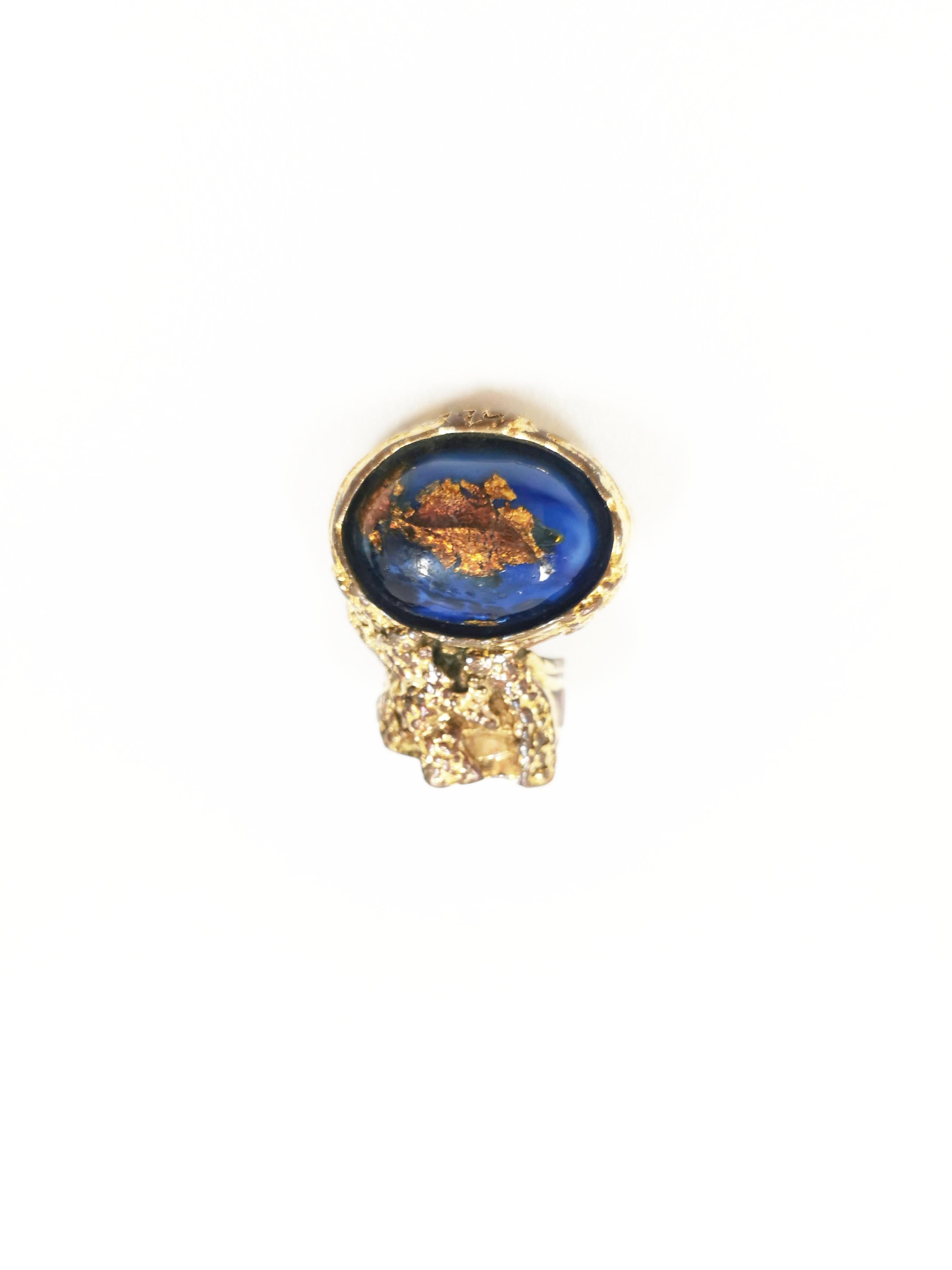 The YSL (Yves Saint Laurent) Arty Ring, also known as the YSL Arty Ovale Ring, is a popular and iconic fashion accessory that was available in a variety of colors and materials. This ring was known for its large, bold design and featured a large,