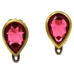 Orecchini vintage YSL con cristalli rosa e tonalità oro