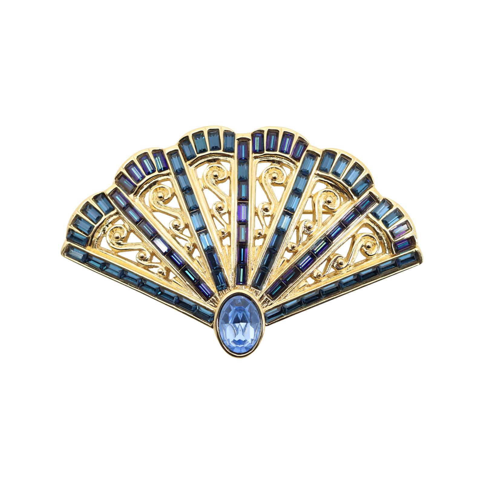 Artist Vintage YSL Gold Tone with Blue Sapphire Crystals Fan Brooch Circa 1990s For Sale