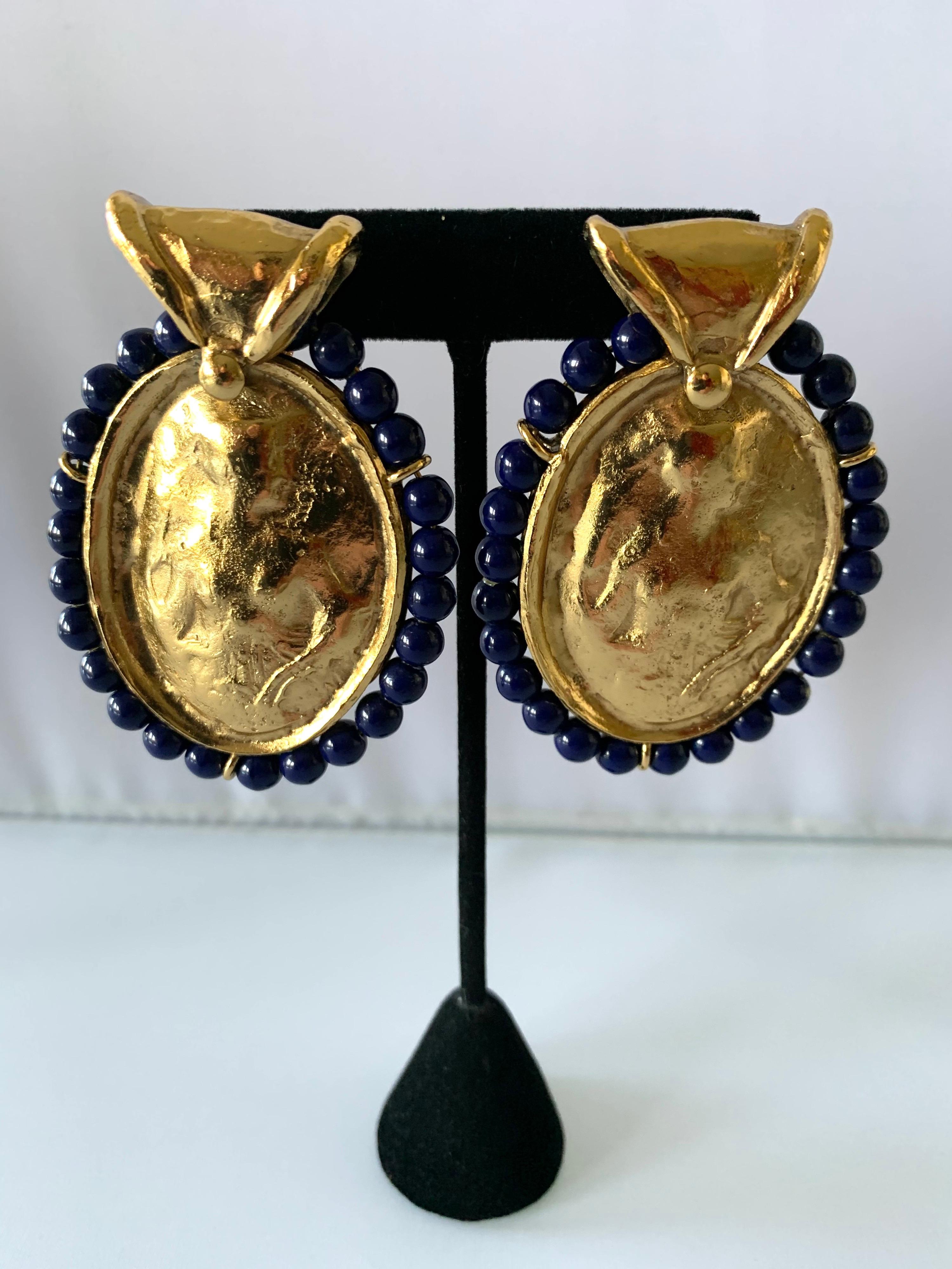 Large vintage Yves Saint Laurent clip-on statement earrings, comprised out of hammered gilt metal 