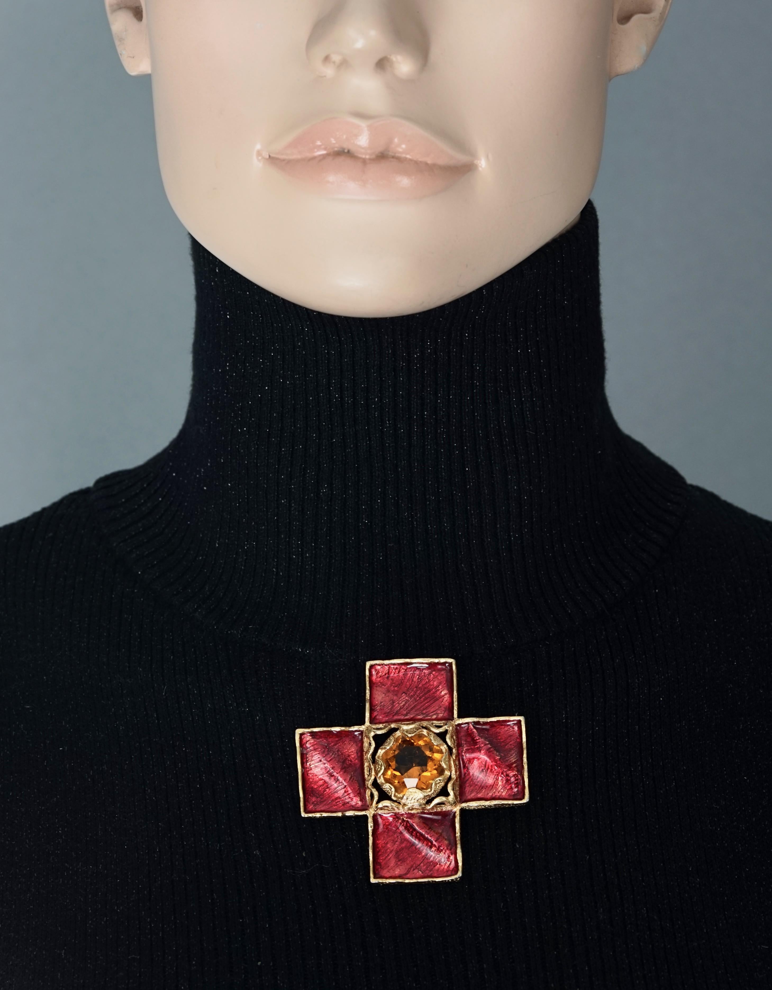 Vintage YSL Yves Saint Laurent by Goossens Wrinkled Red Cross Enamel Brooch 

Measurements:
Height: 2.4 inches (6 cm)
Width: 2.4 inches (6 cm)

Features:
- 100% Authentic YVES SAINT LAURENT by Robert Goossens .
- Red wrinkled enamel cross brooch.
-