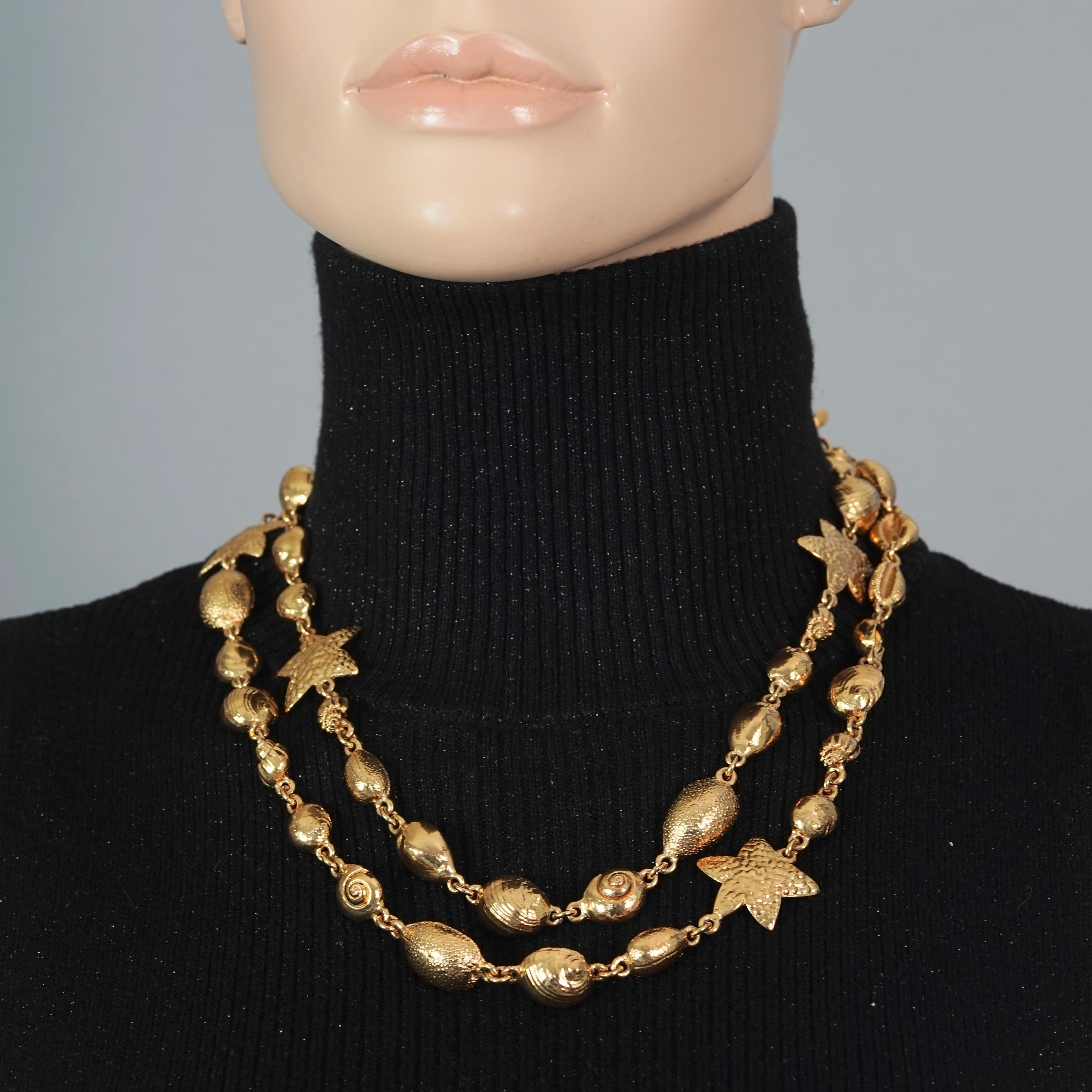 Vintage YSL Yves Saint Laurent by Robert Goossens Sea Shells Textured Necklace

Measurements:
Height: 1 inch (2.54 cm)
Total Length: 43 6/8inches (111.12 cm)

Features:
- 100% Authentic YVES SAINT LAURENT by Robert Goossens.
- Articulated links of