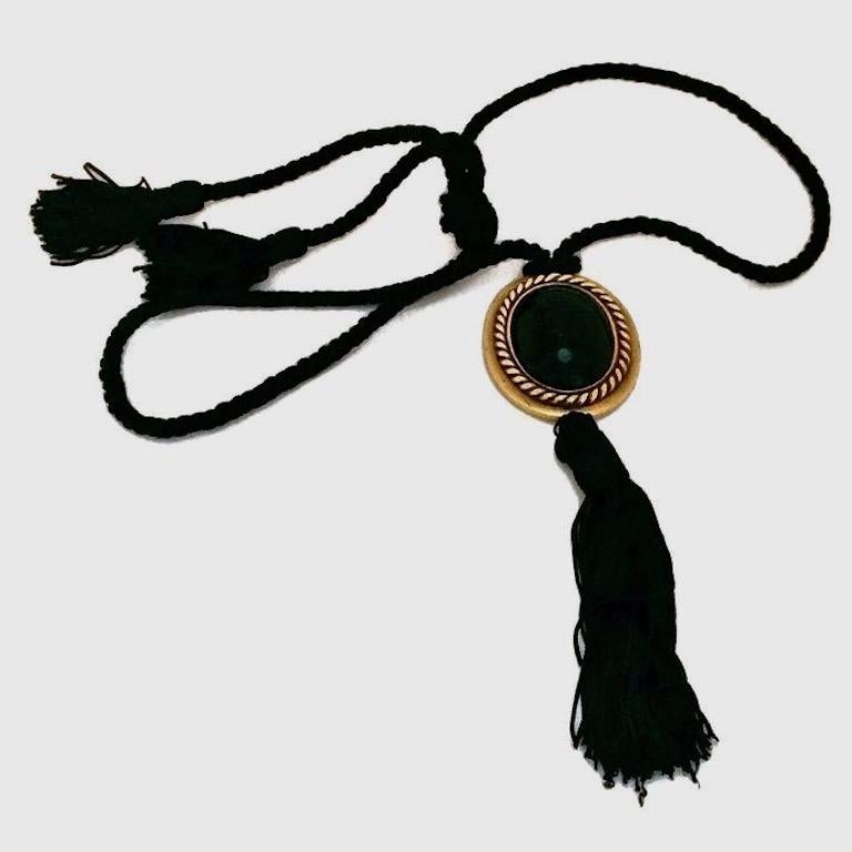 Vintage YSL Yves Saint Laurent Onyx Tassel Russian Collection Necklace

Measurements:
Height: 6.10 inches (15.5 cm) top pendant to end of tassel
Length: 18.11 inches (46 cm) including tassels

Features:
- 100% Authentic YVES SAINT LAURENT.
- Faux