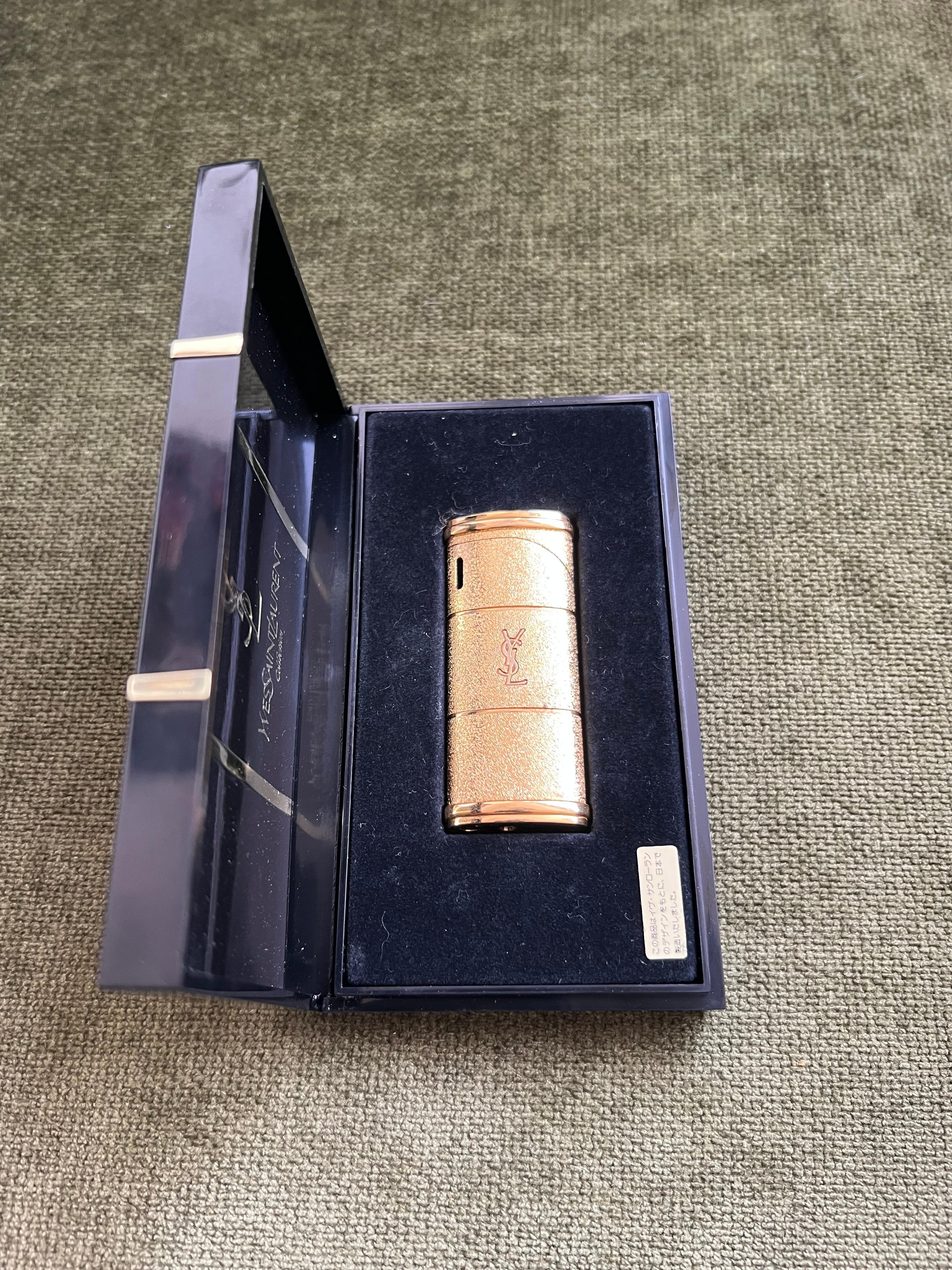 Vintage “YSL” Yves Saint Laurent Retro Cigarette Gold Tone Lighter, Circa 1980s In Excellent Condition For Sale In New York, NY