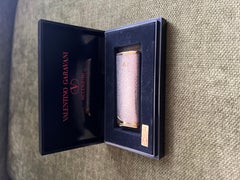 Vintage “YSL” Yves Saint Laurent Retro Gold Silver Lighter, Circa 1980s
