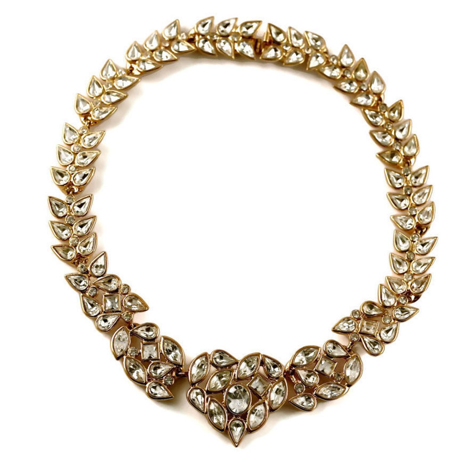 Vintage YSL Yves Saint Laurent Robert Goossens Rhinestone Heart Necklace

Measurements:
Height: 1 3/8 inches (3.49 cm)
Wearable Length: 16 6/8 inches (42.54 cm)

Features:
- 100% Authentic YVES SAINT LAURENT by Robert Goossens.
- Studded with clear